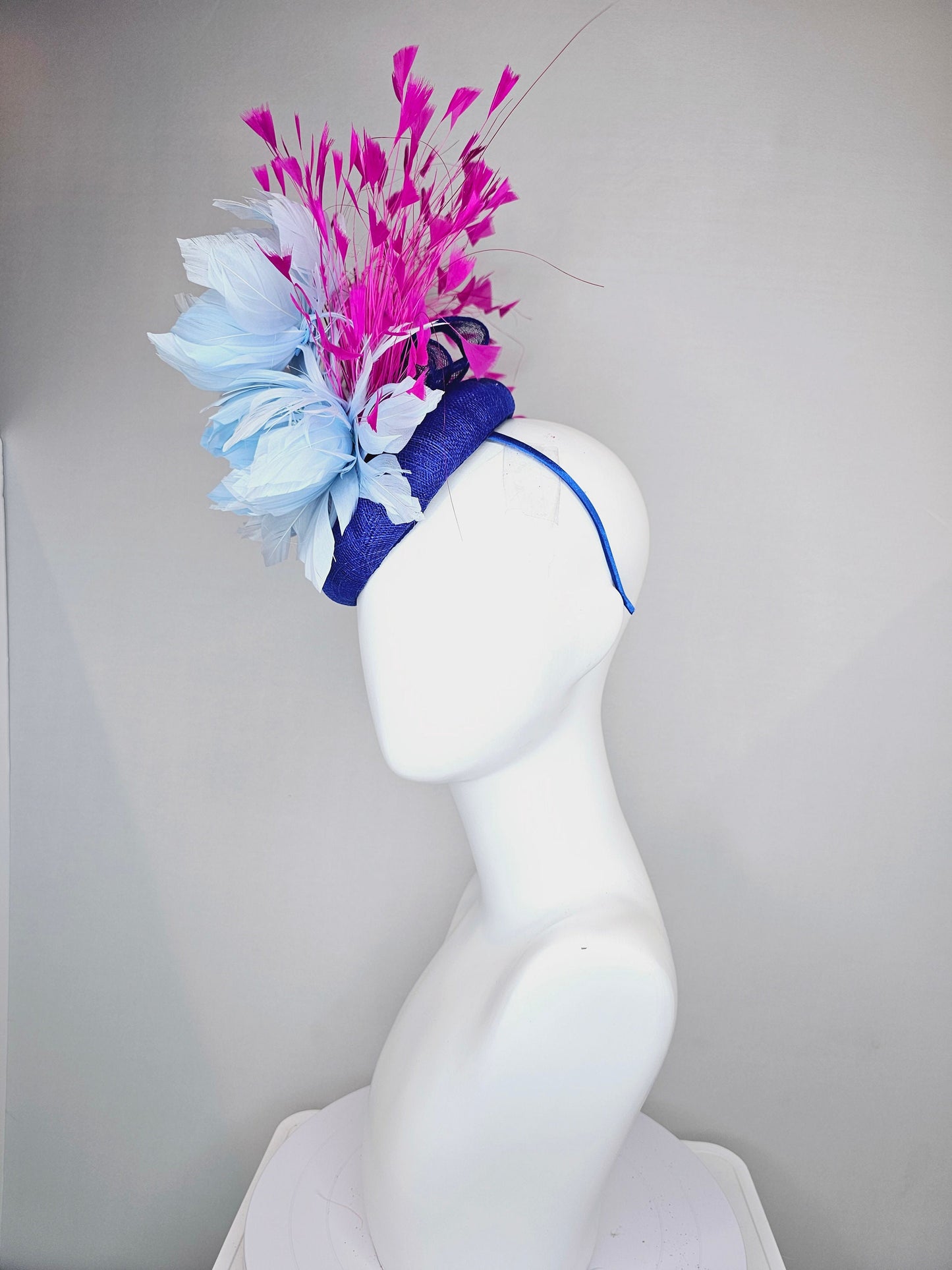 kentucky derby hat fascinator royal blue sinamay with large fluffy light blue feather flowers and fuchsia hot pink feathers