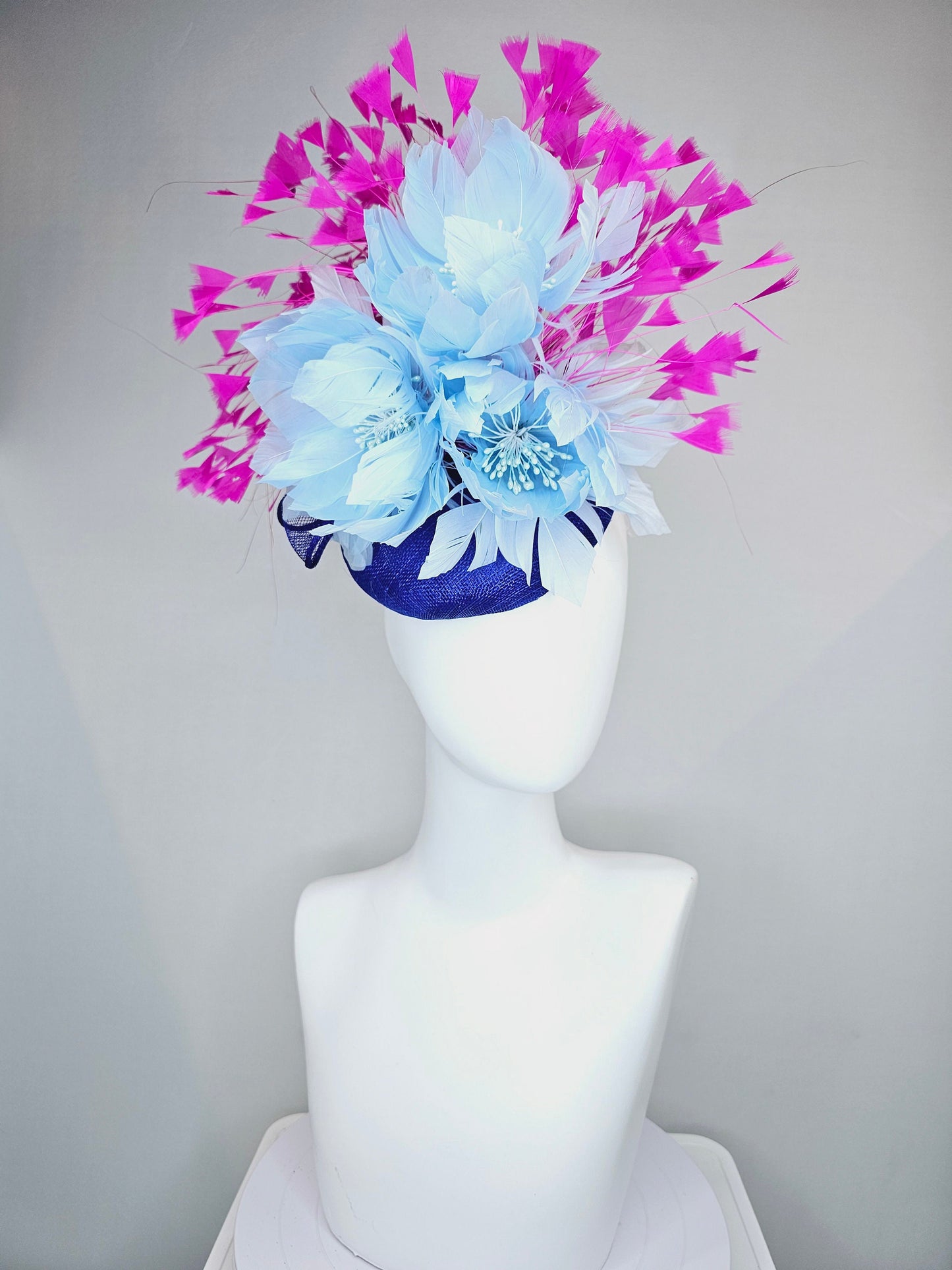 kentucky derby hat fascinator royal blue sinamay with large fluffy light blue feather flowers and fuchsia hot pink feathers