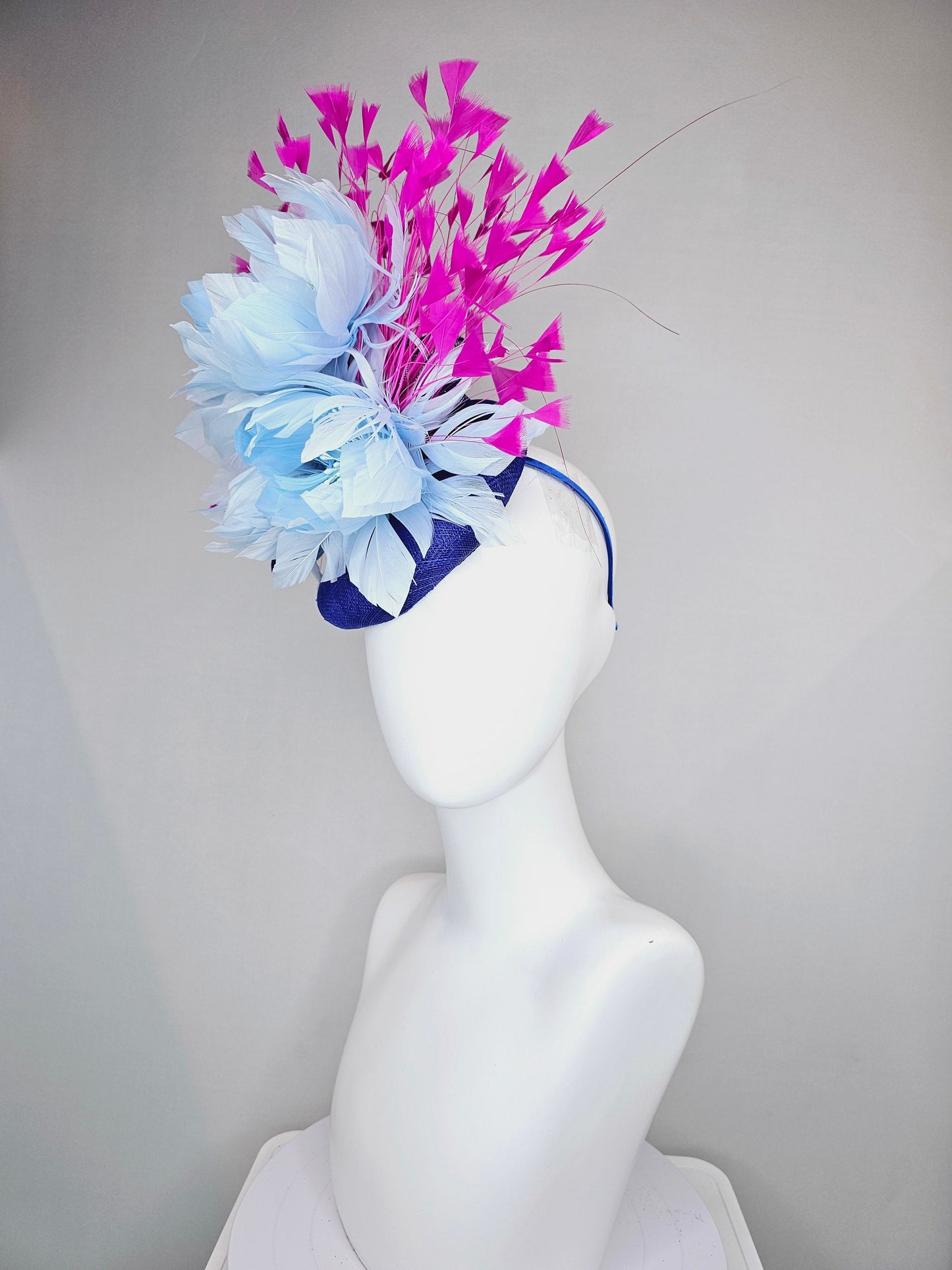 kentucky derby hat fascinator royal blue sinamay with large fluffy light blue feather flowers and fuchsia hot pink feathers