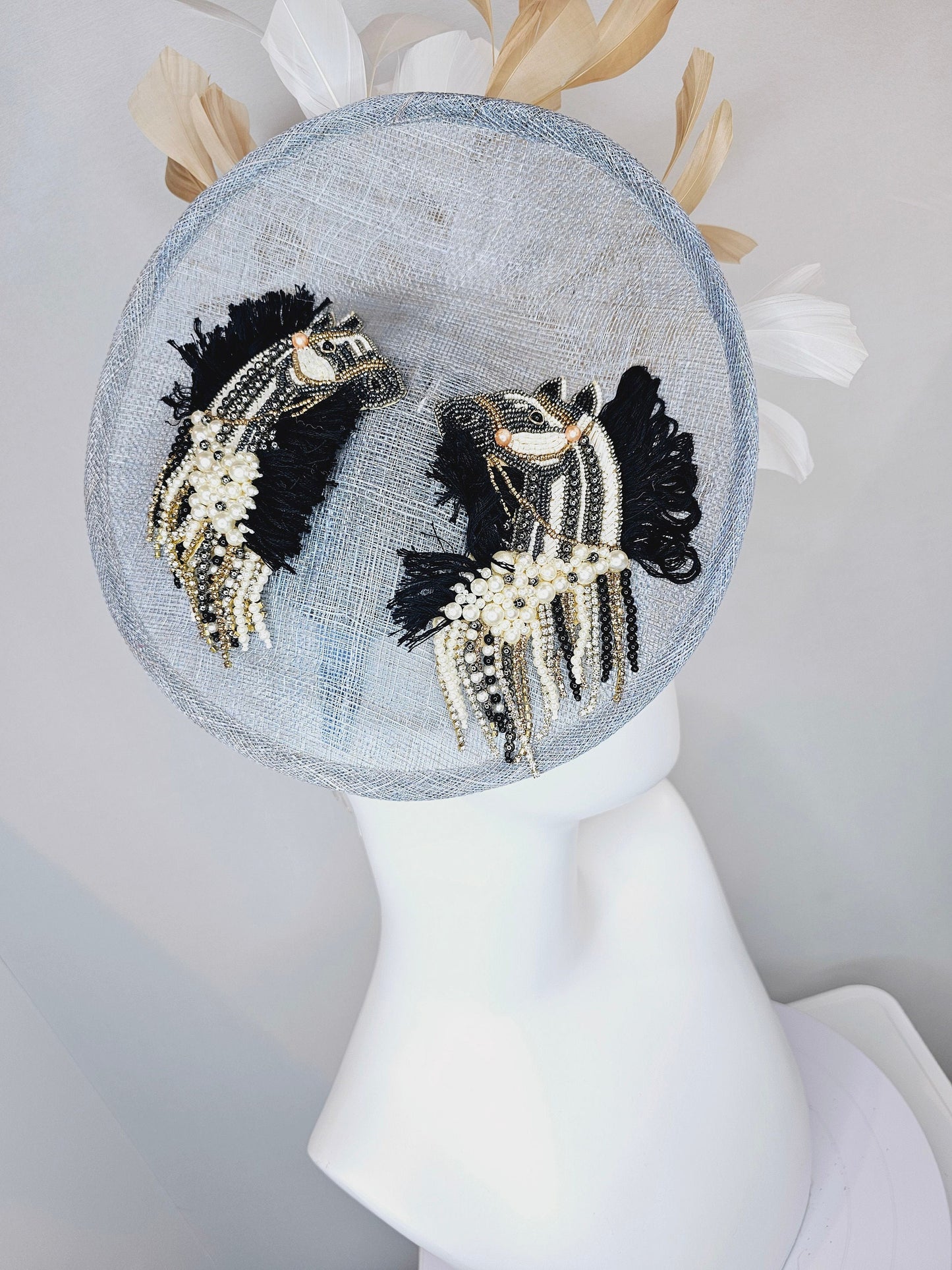 kentucky derby hat fascinator light blue sinamay saucer white gold feathers embroidered black white gold beaded fringe horse decor