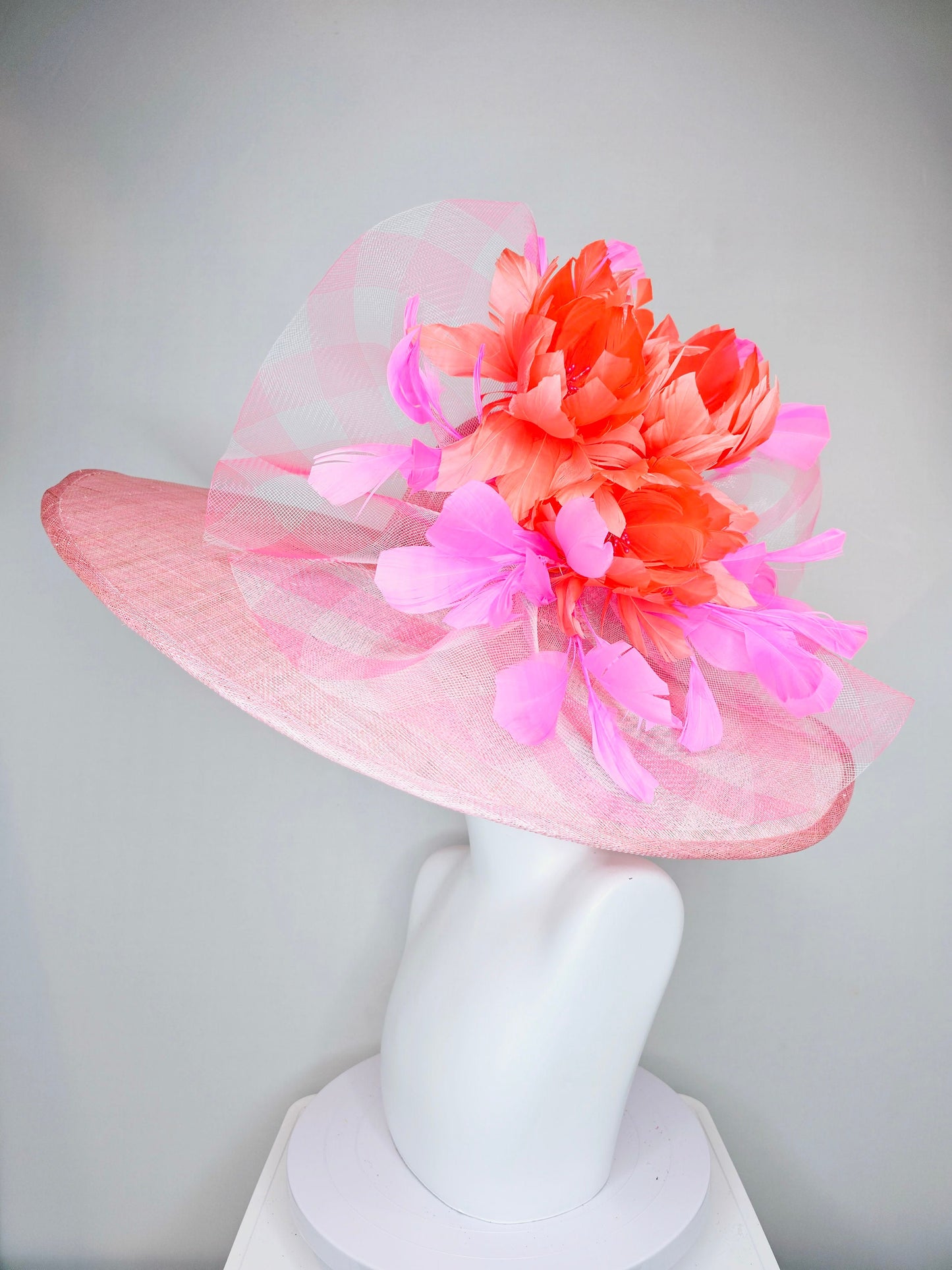 kentucky derby hat large wide brim sinamay light pink hat with large pink feather orange coral feather flowers and crinoline