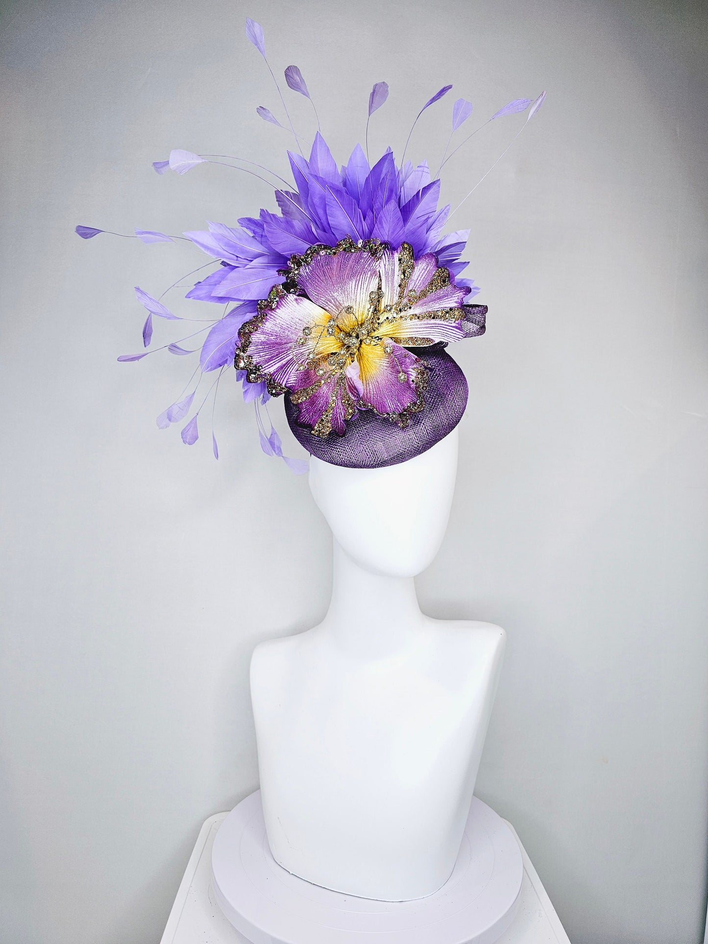 kentucky derby hat fascinator purple sinamay with large purple gold sparkle flower violet lavender feathers