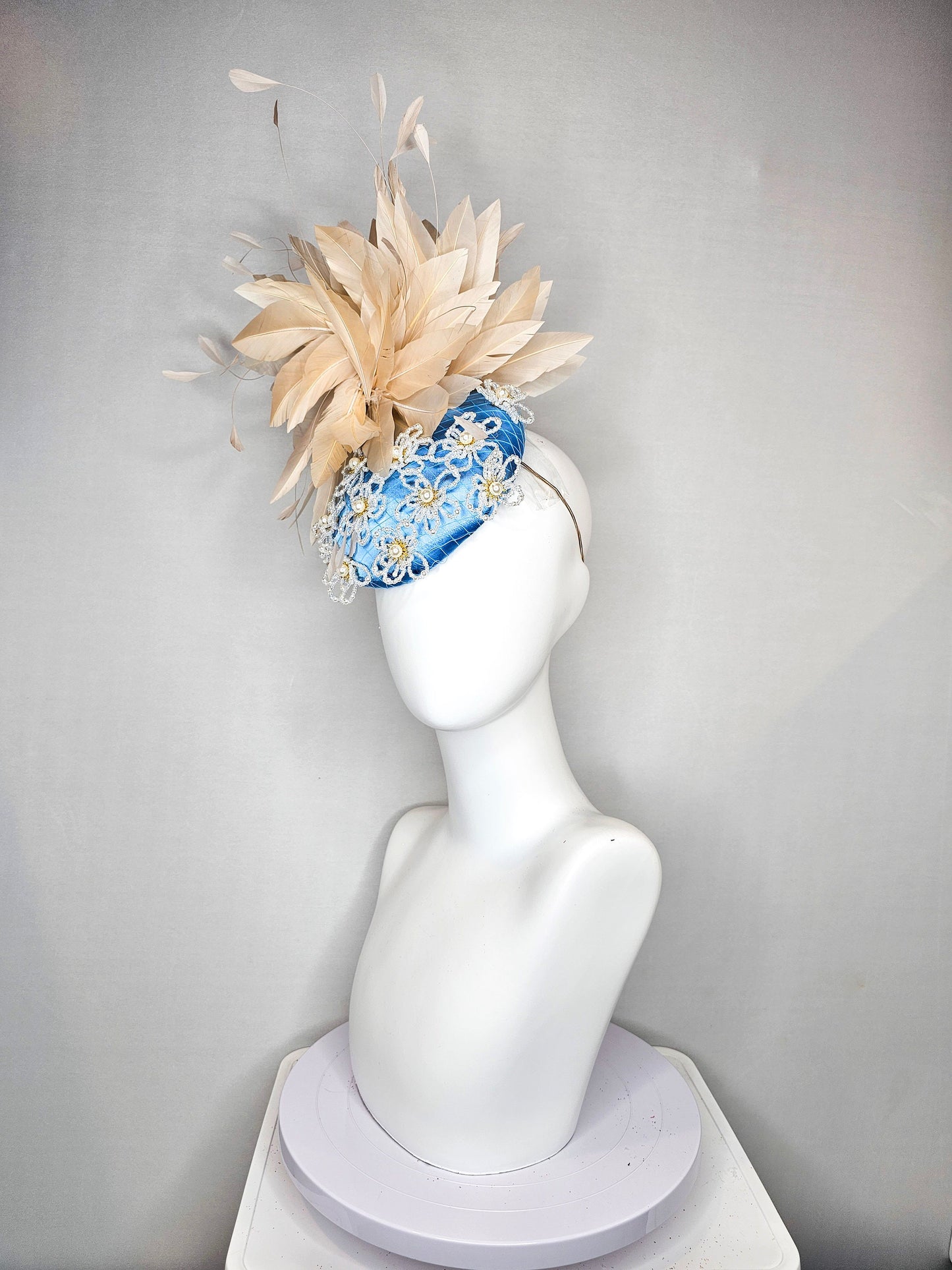 kentucky derby hat fascinator hat light blue satin with large apricot champagne peach feathers with beige gold white pearl beaded flowers