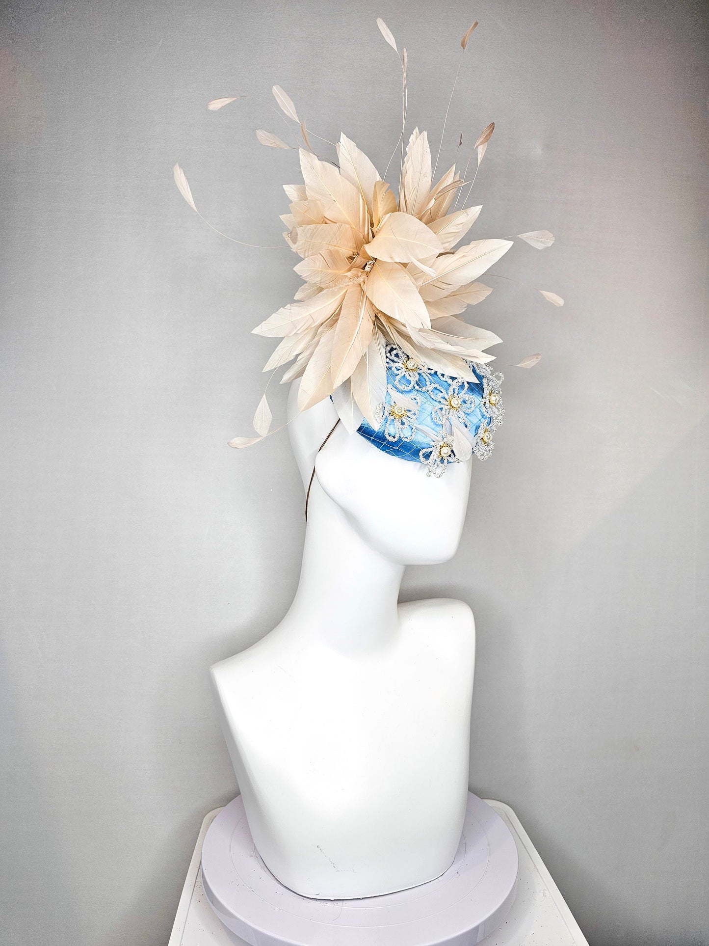 kentucky derby hat fascinator hat light blue satin with large apricot champagne peach feathers with beige gold white pearl beaded flowers
