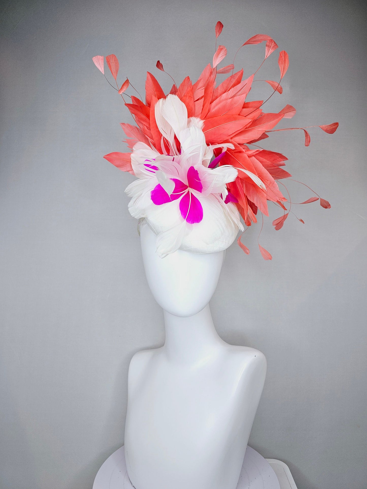 kentucky derby hat fascinator white satin with orange coral feathers with white and fuchsia pink feather flower