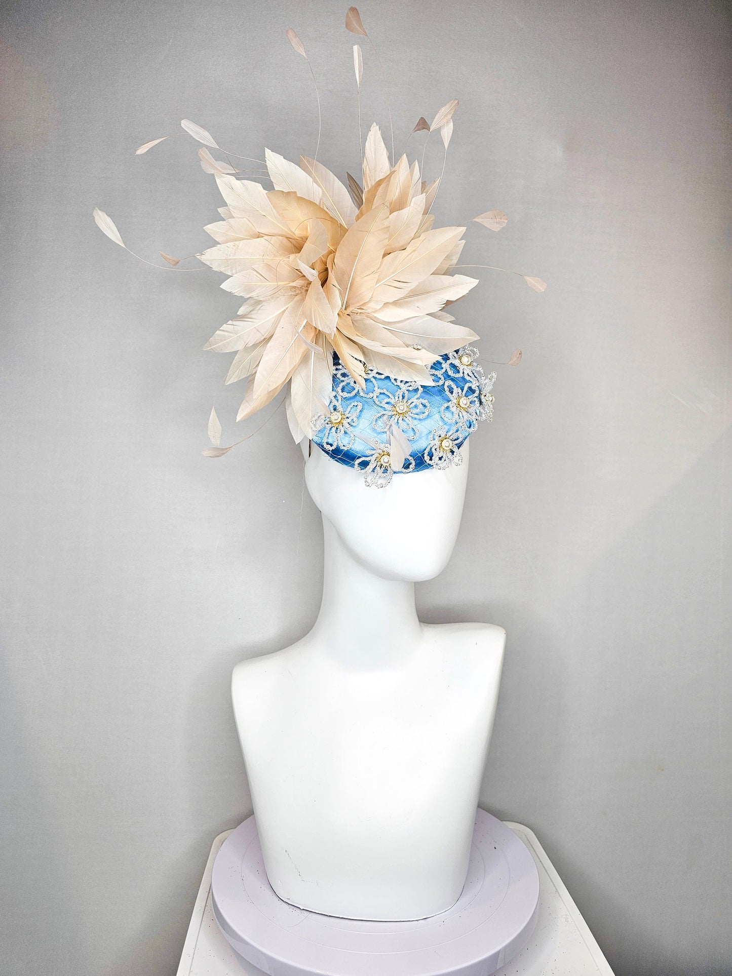 kentucky derby hat fascinator hat light blue satin with large apricot champagne peach feathers with beige gold white pearl beaded flowers