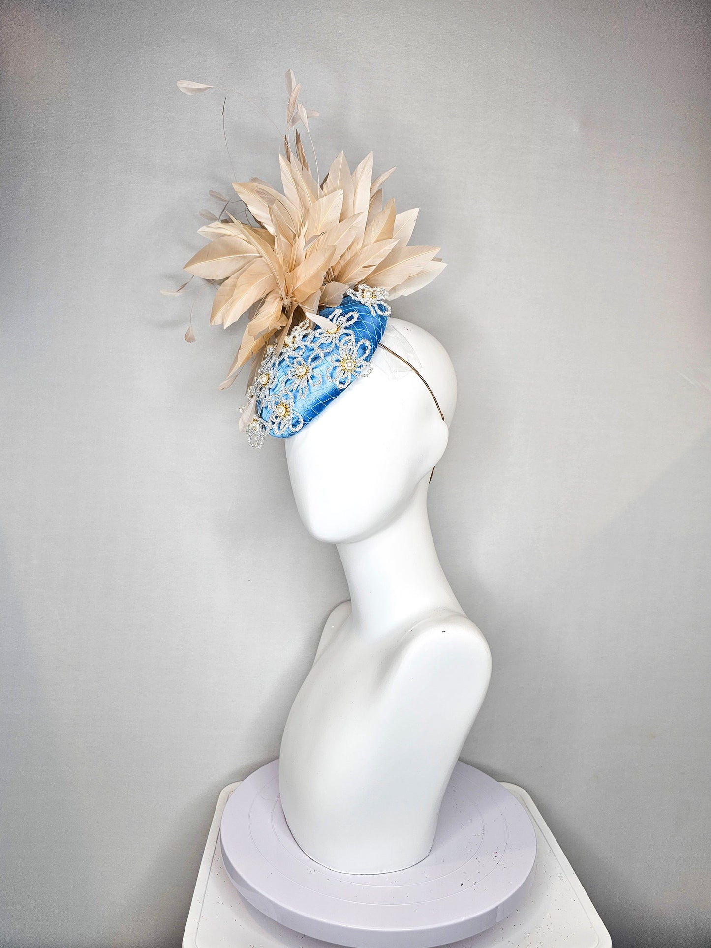 kentucky derby hat fascinator hat light blue satin with large apricot champagne peach feathers with beige gold white pearl beaded flowers