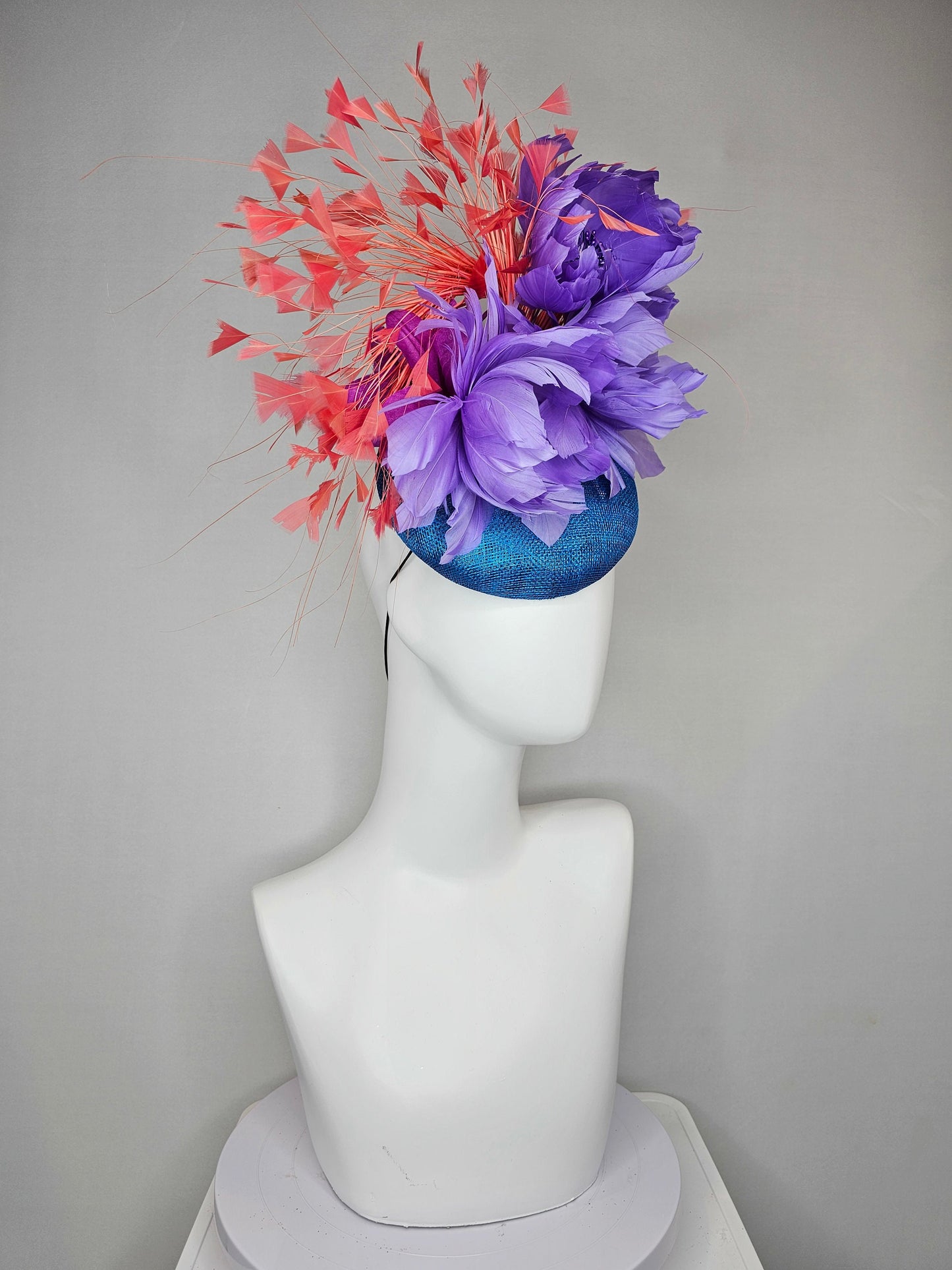 kentucky derby hat fascinator turquoise blue sinamay orange coral feathers and lavender purple fluffy feather flowers