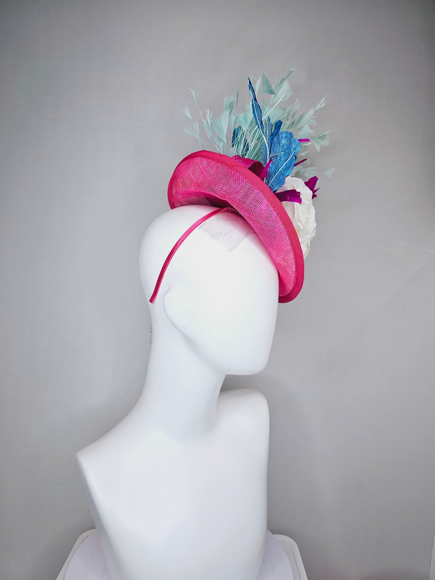 kentucky derby hat fascinator pink sinamay saucer with white roses turquoise blue leaves and mint green feathers