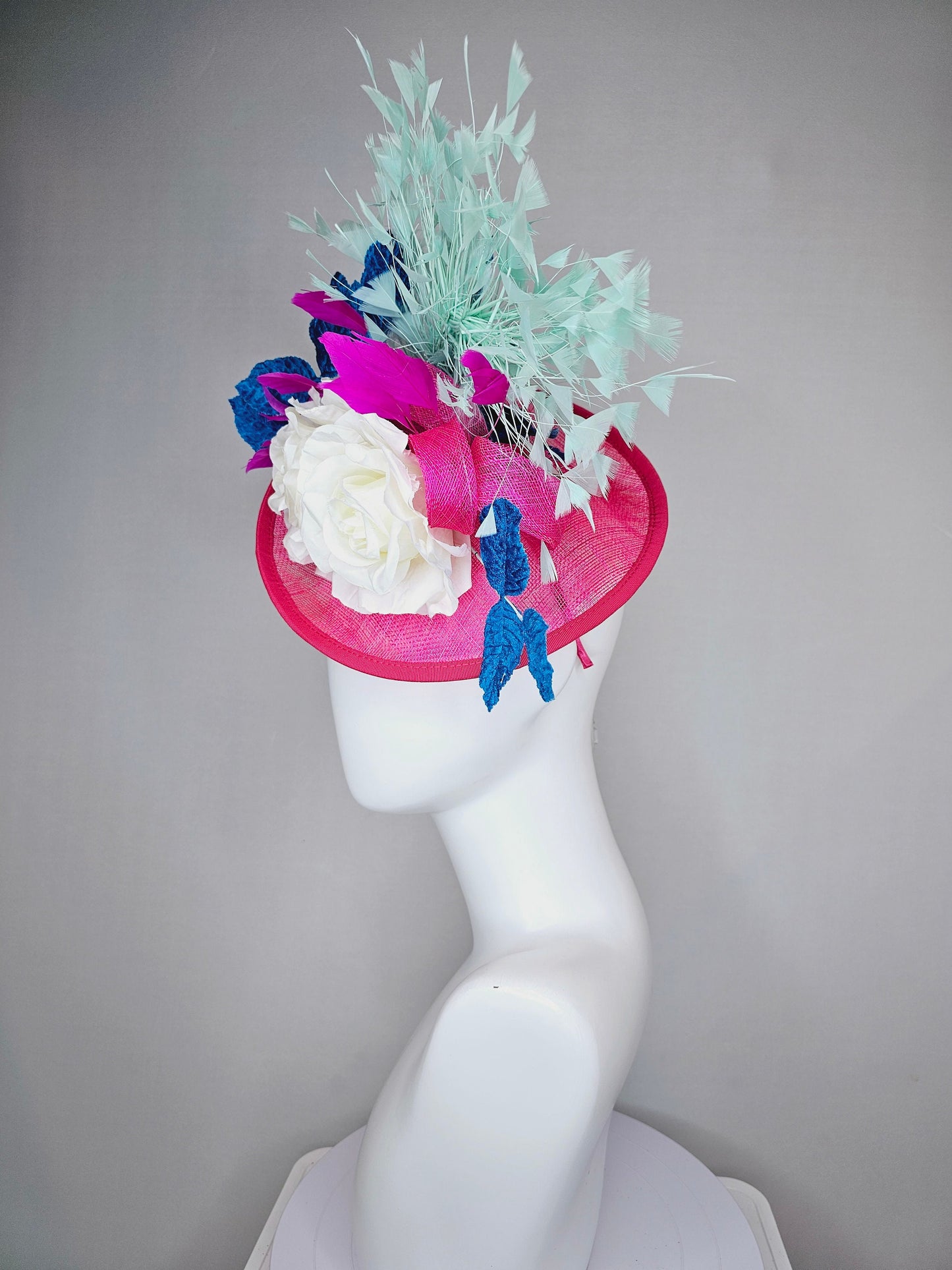 kentucky derby hat fascinator pink sinamay saucer with white roses turquoise blue leaves and mint green feathers