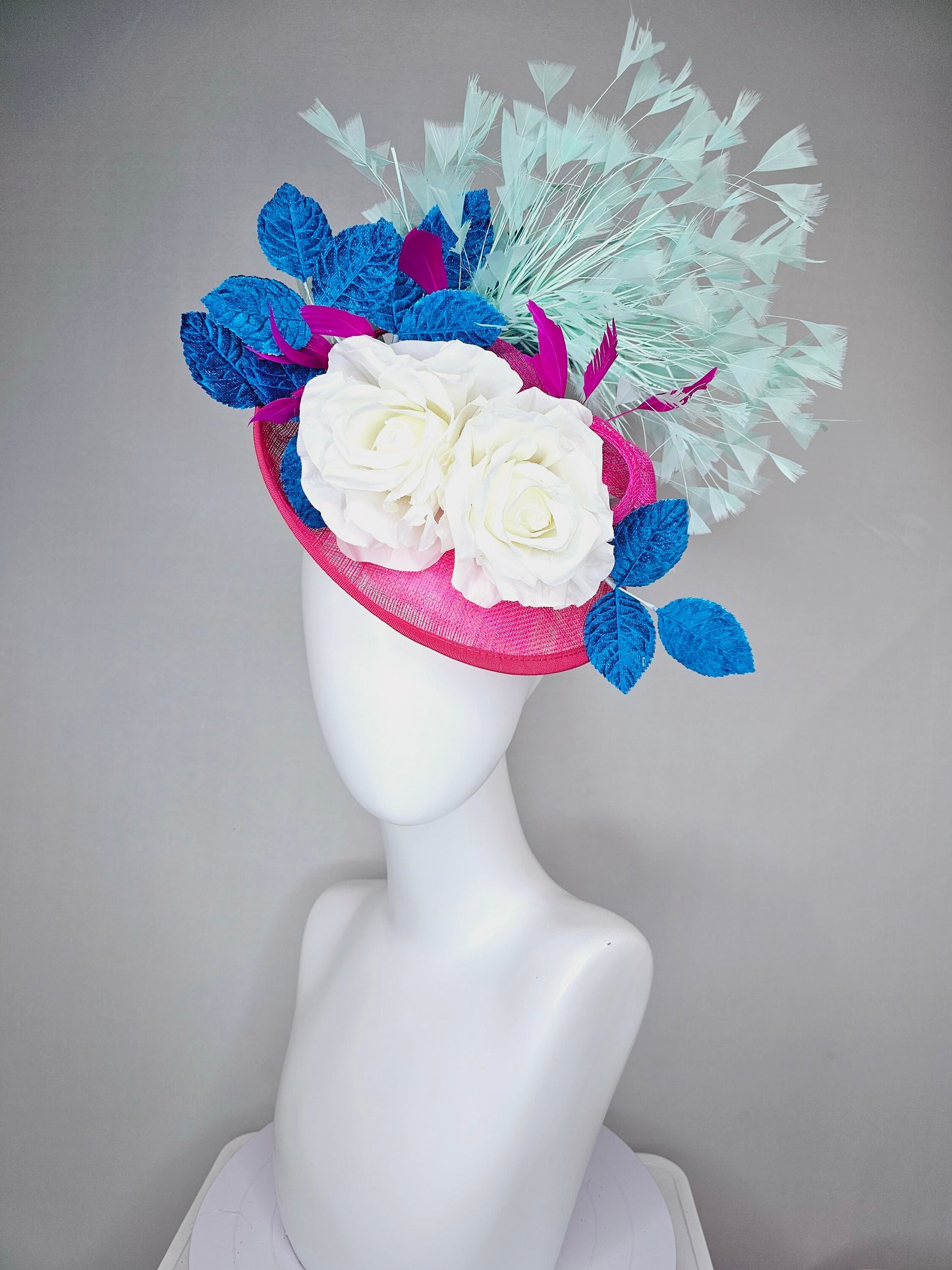 kentucky derby hat fascinator pink sinamay saucer with white roses turquoise blue leaves and mint green feathers