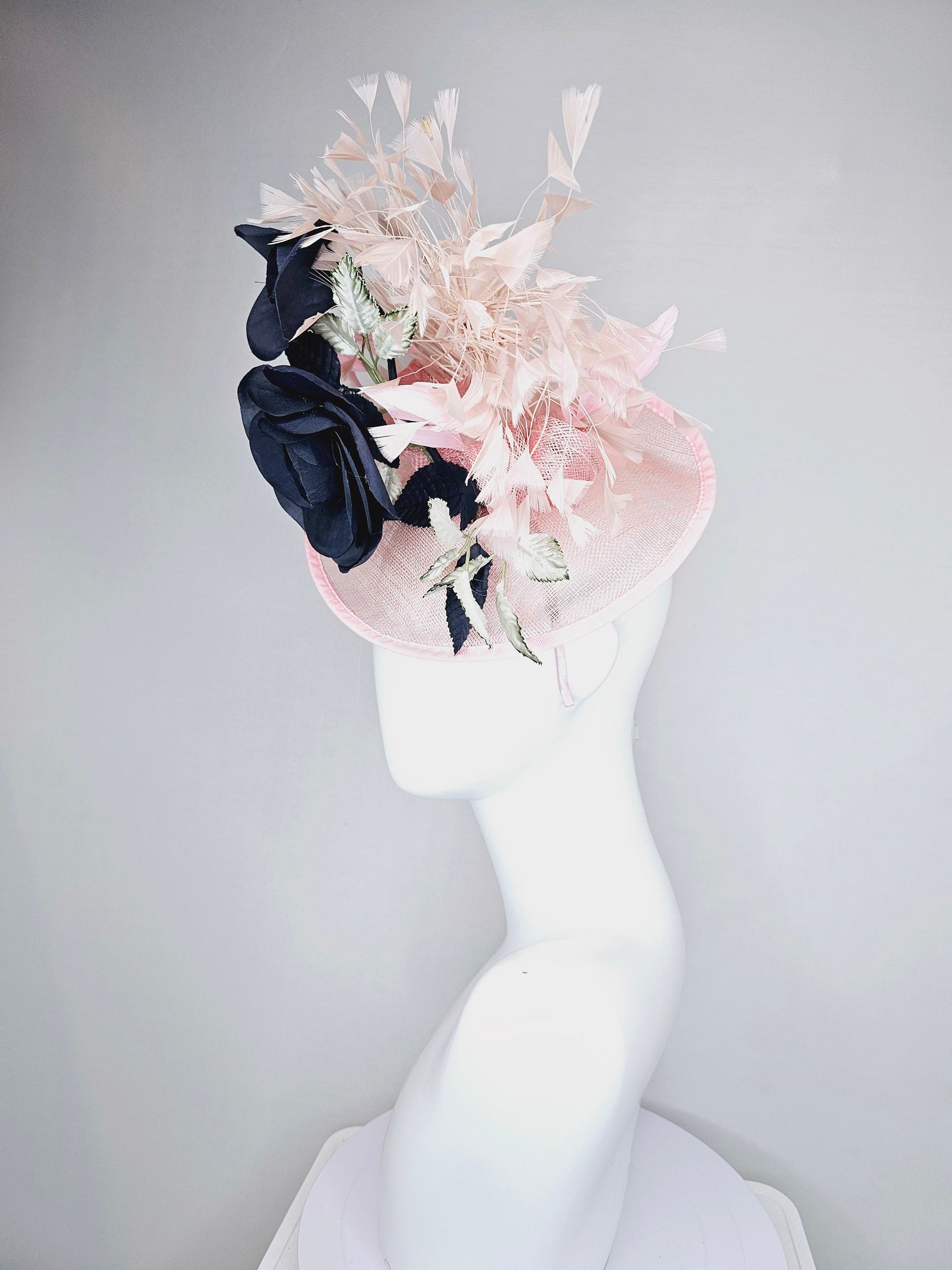 kentucky derby hat fascinator light pink sinamay saucer with black silk flowers silver green ivory leaves and pink feathers