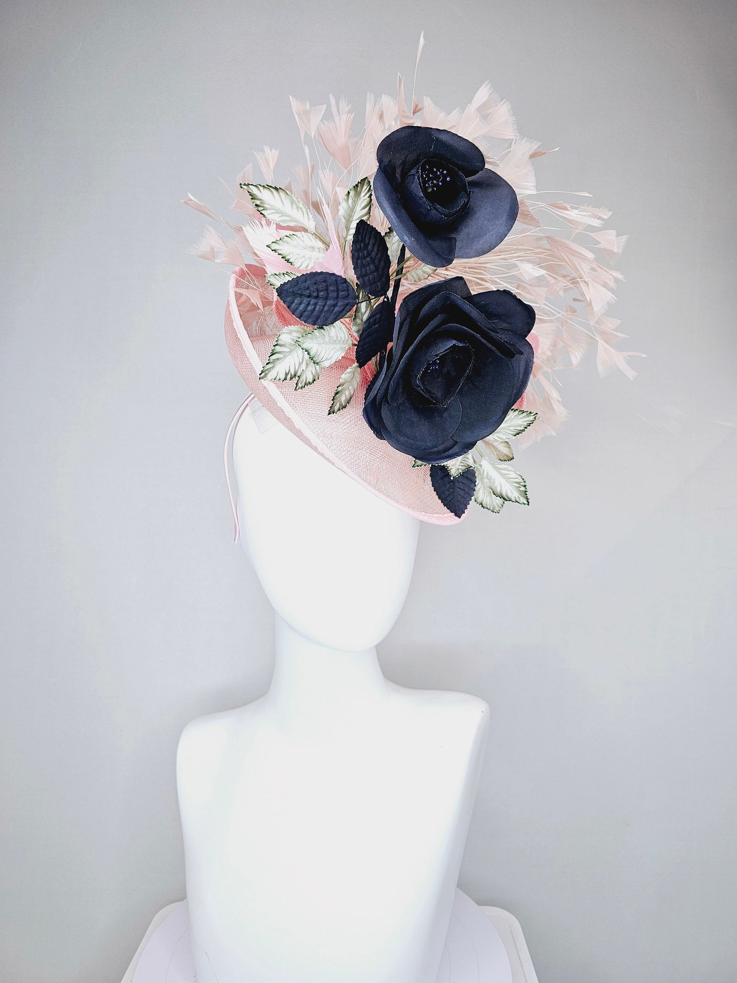 kentucky derby hat fascinator light pink sinamay saucer with black silk flowers silver green ivory leaves and pink feathers