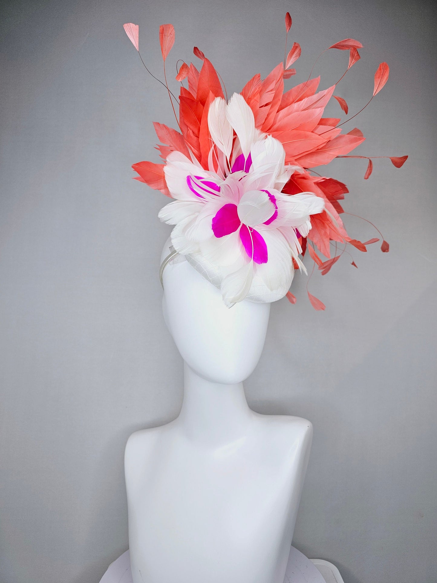 kentucky derby hat fascinator white satin with orange coral feathers with white and fuchsia pink feather flower