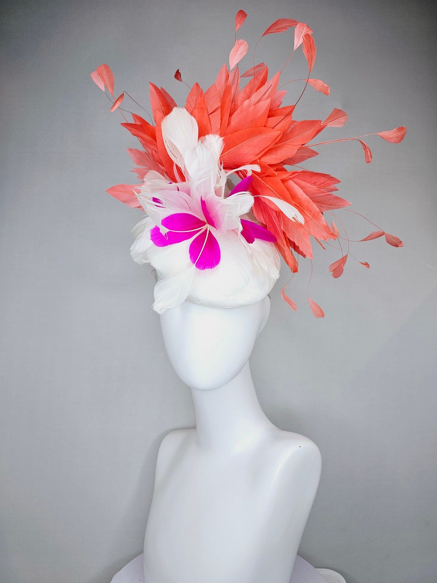 kentucky derby hat fascinator white satin with orange coral feathers with white and fuchsia pink feather flower