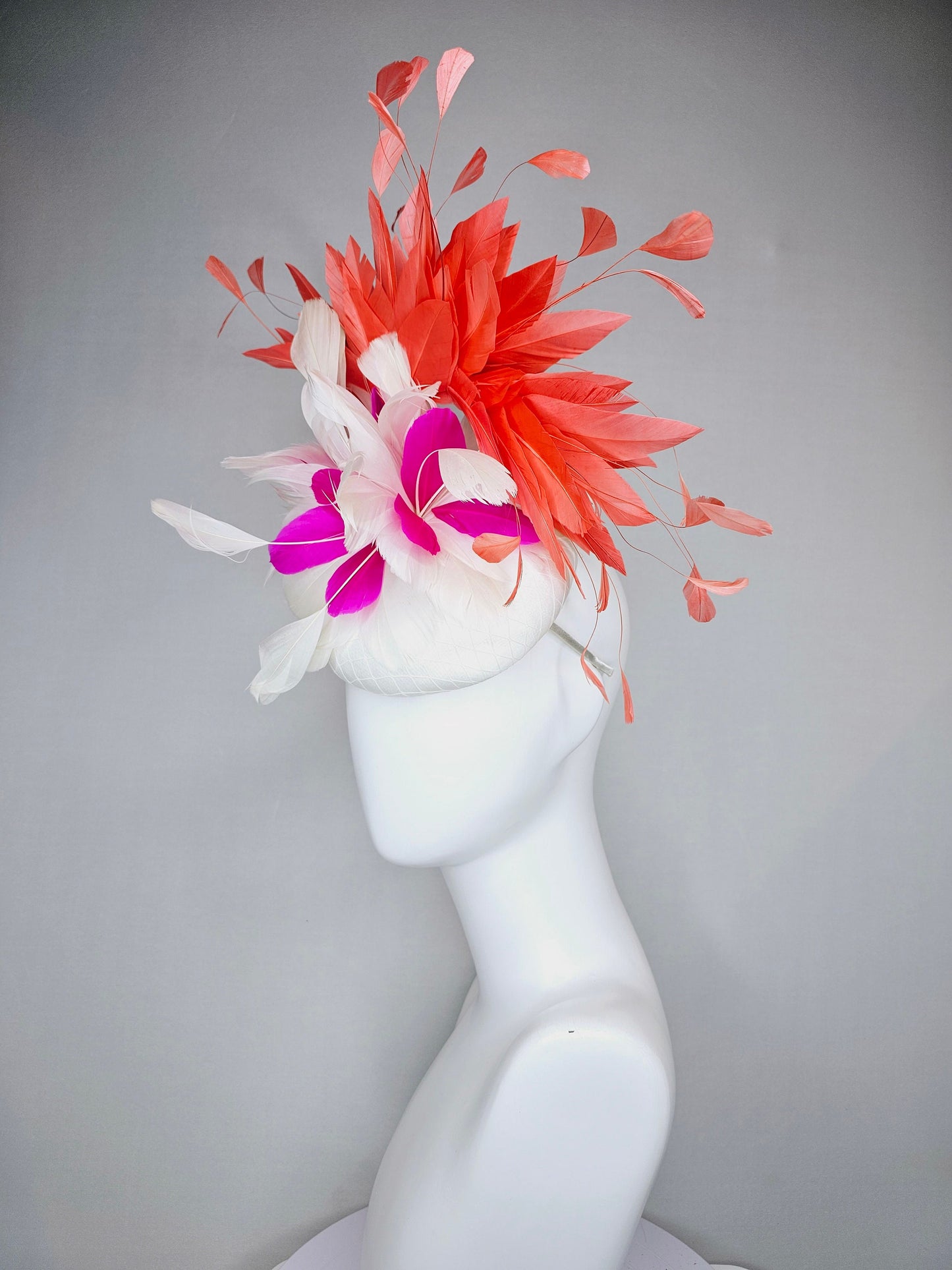 kentucky derby hat fascinator white satin with orange coral feathers with white and fuchsia pink feather flower