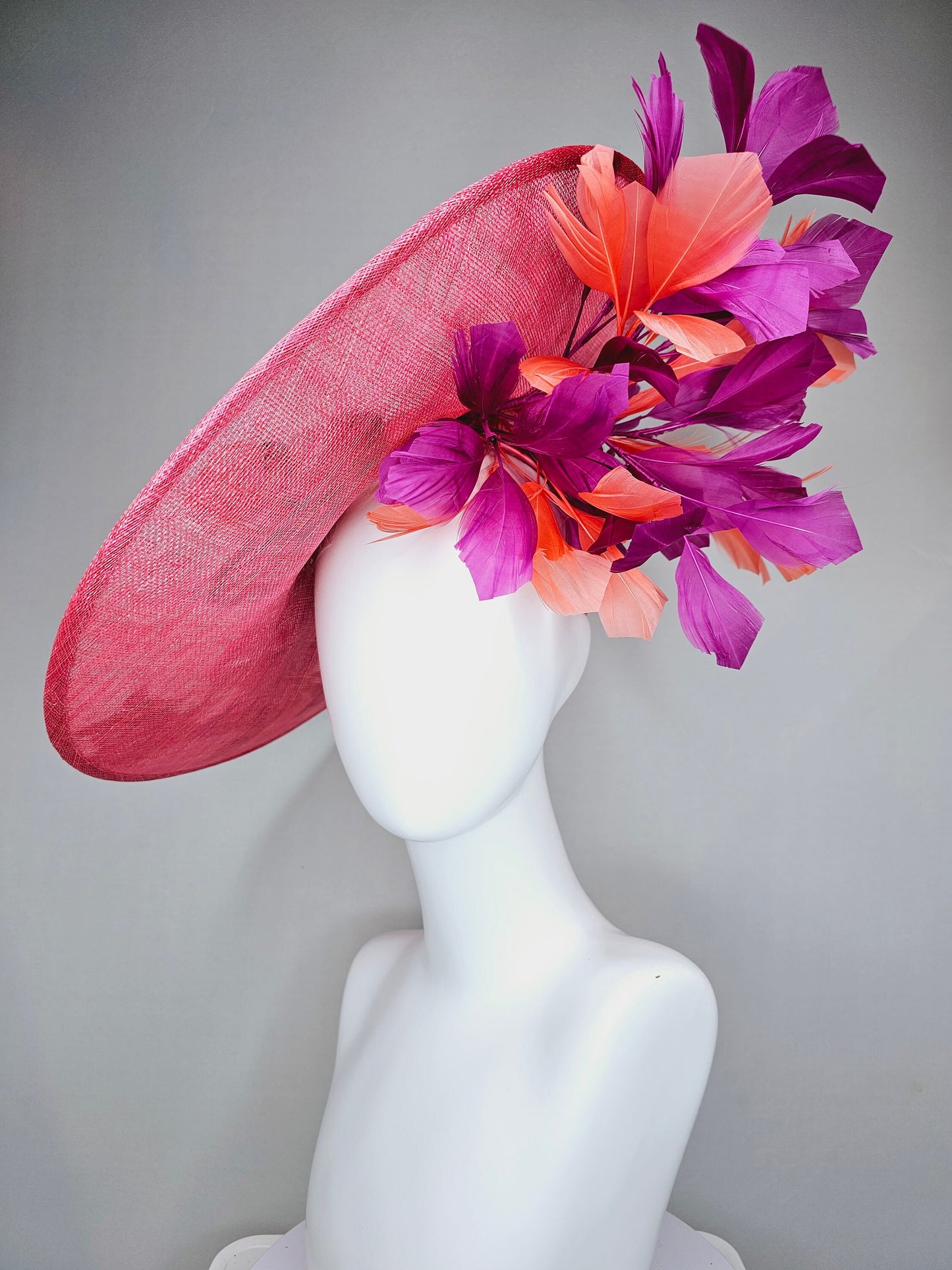 kentucky derby hat fascinator bright pink coral sinamay saucer with lavender purple coral yellow embroidered flowers purple coral feathers