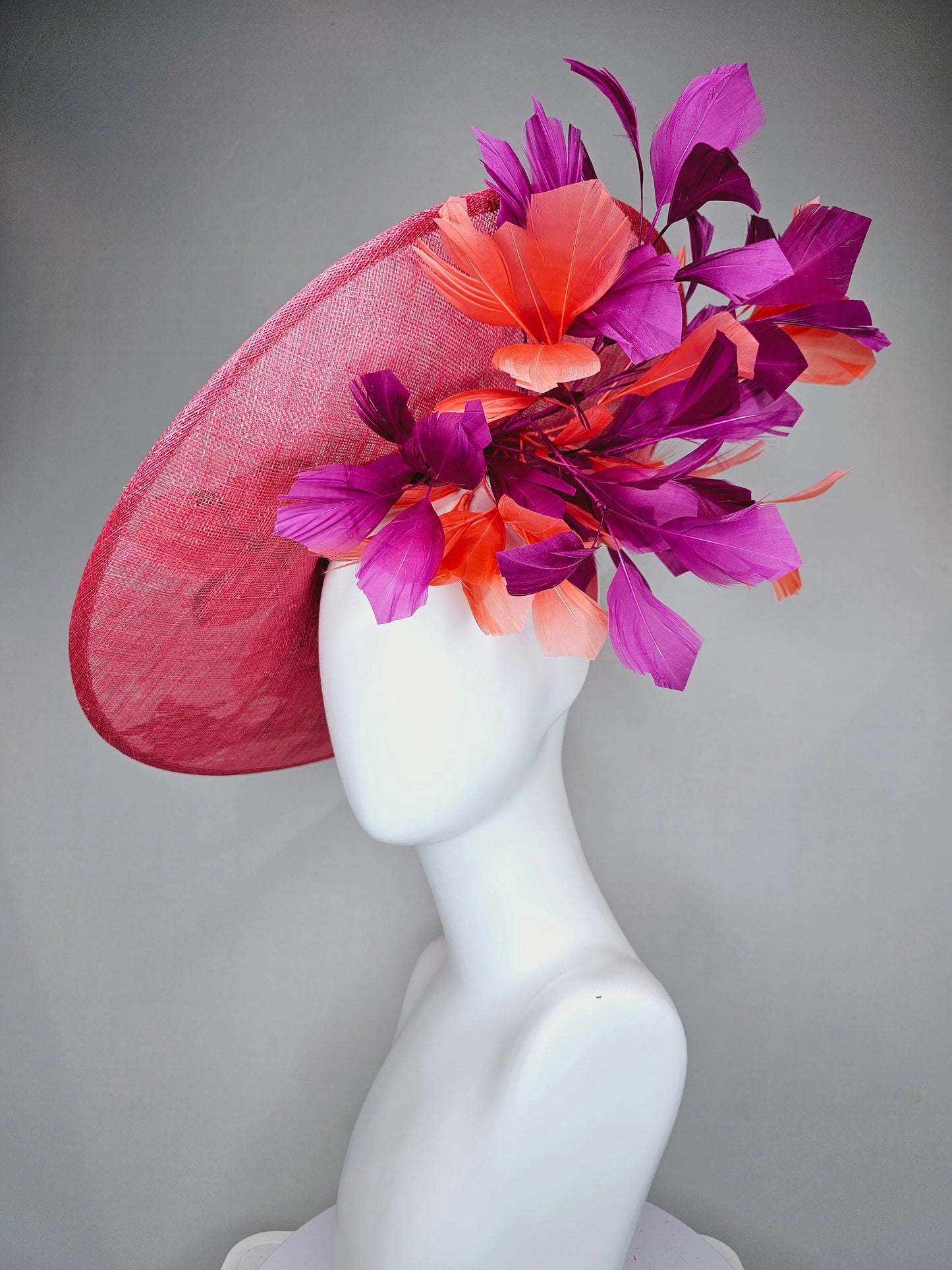 kentucky derby hat fascinator bright pink coral sinamay saucer with lavender purple coral yellow embroidered flowers purple coral feathers