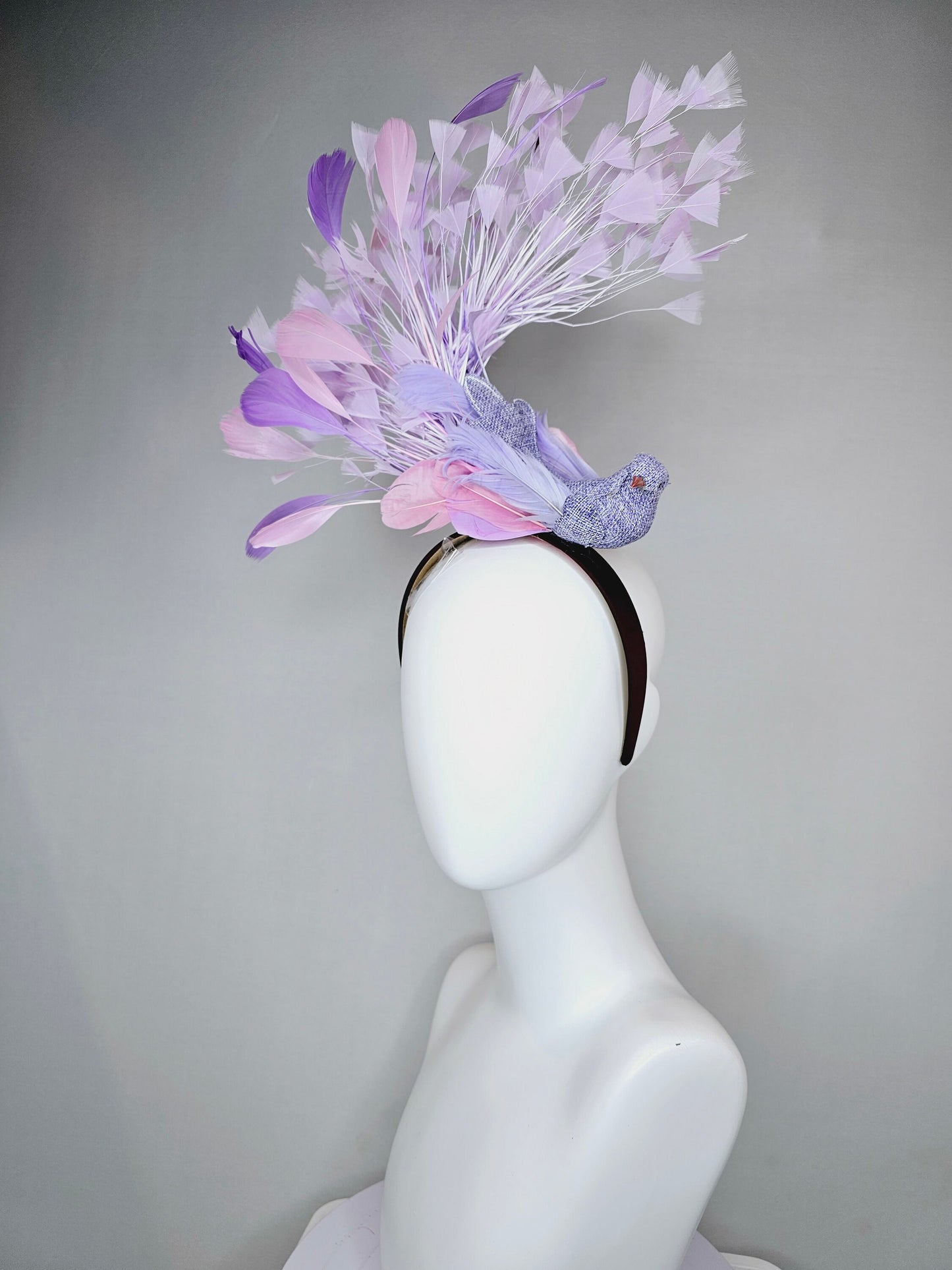 kentucky derby hat fascinator dark brown brunette satin headband with purple bird and purple lavender pink feathers