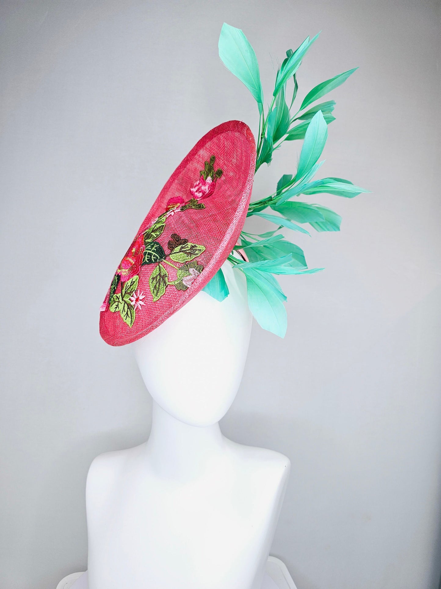 kentucky derby hat peach pink sinamay saucer with peach green gold pink embroidered flowers with green feathers
