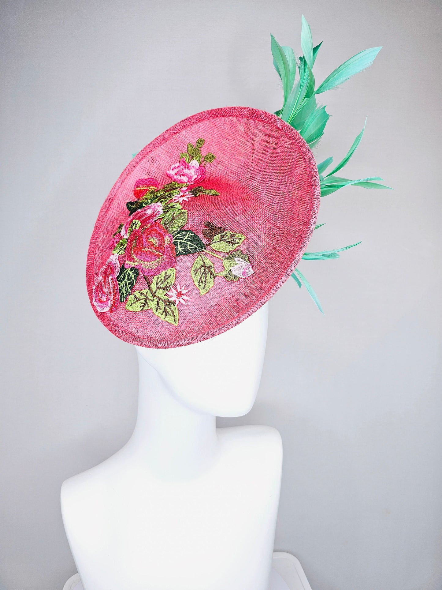 kentucky derby hat peach pink sinamay saucer with peach green gold pink embroidered flowers with green feathers