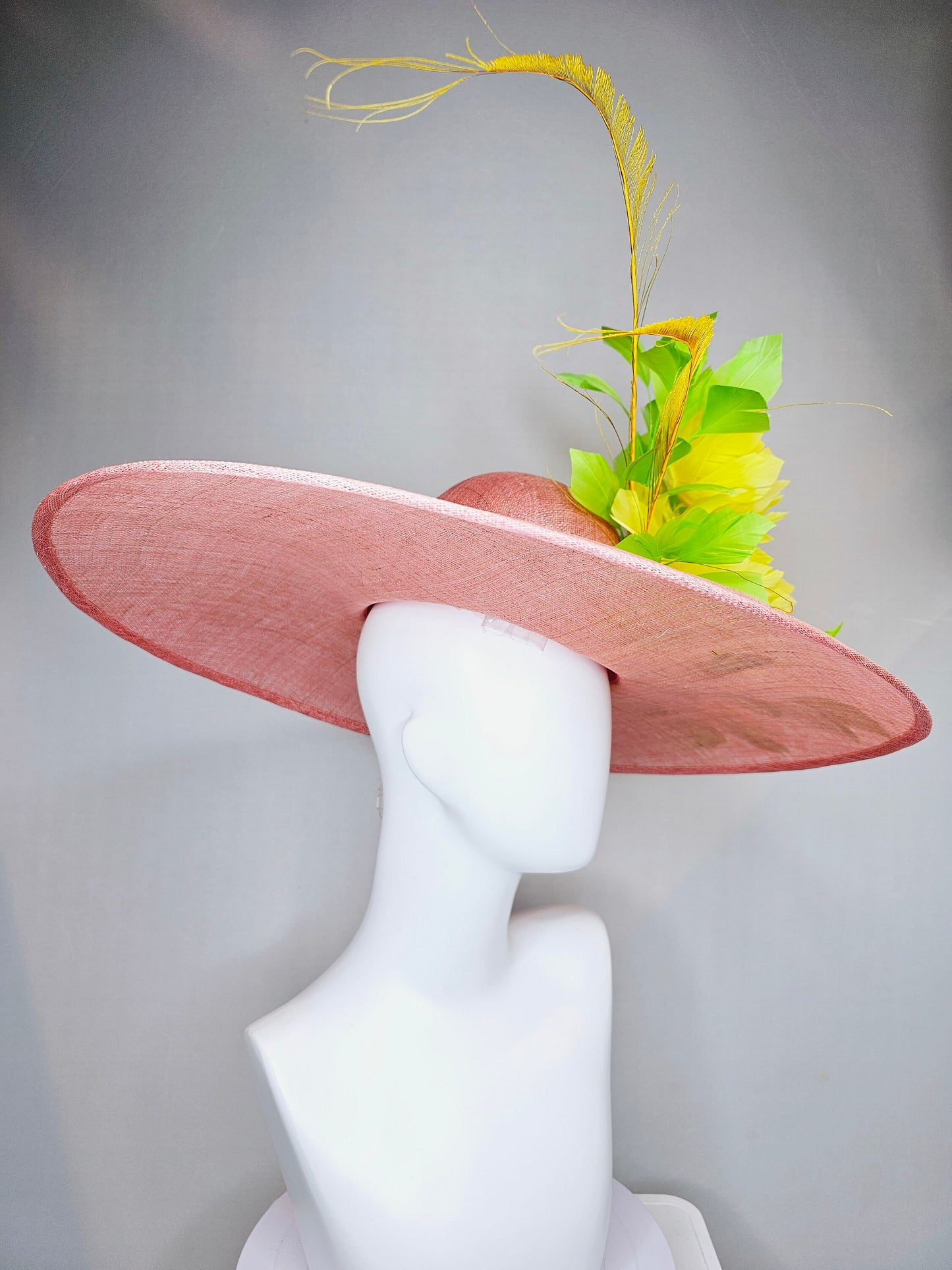 kentucky derby hat large wide brim sinamay blush pink hat w large green feathers bright yellow feather flowers w long tall yellow feathers
