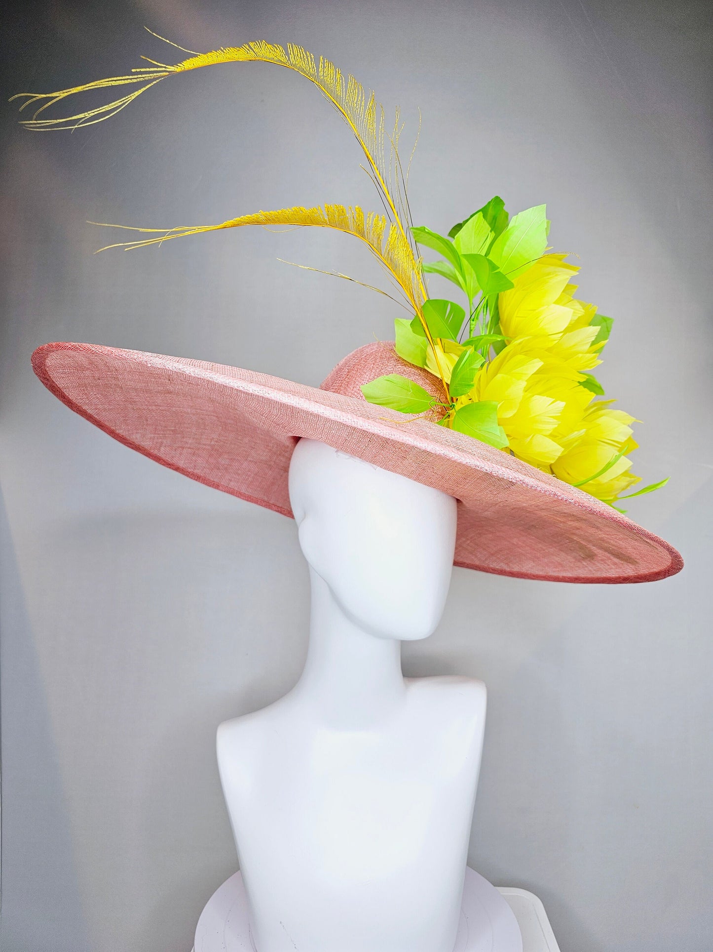 kentucky derby hat large wide brim sinamay blush pink hat w large green feathers bright yellow feather flowers w long tall yellow feathers