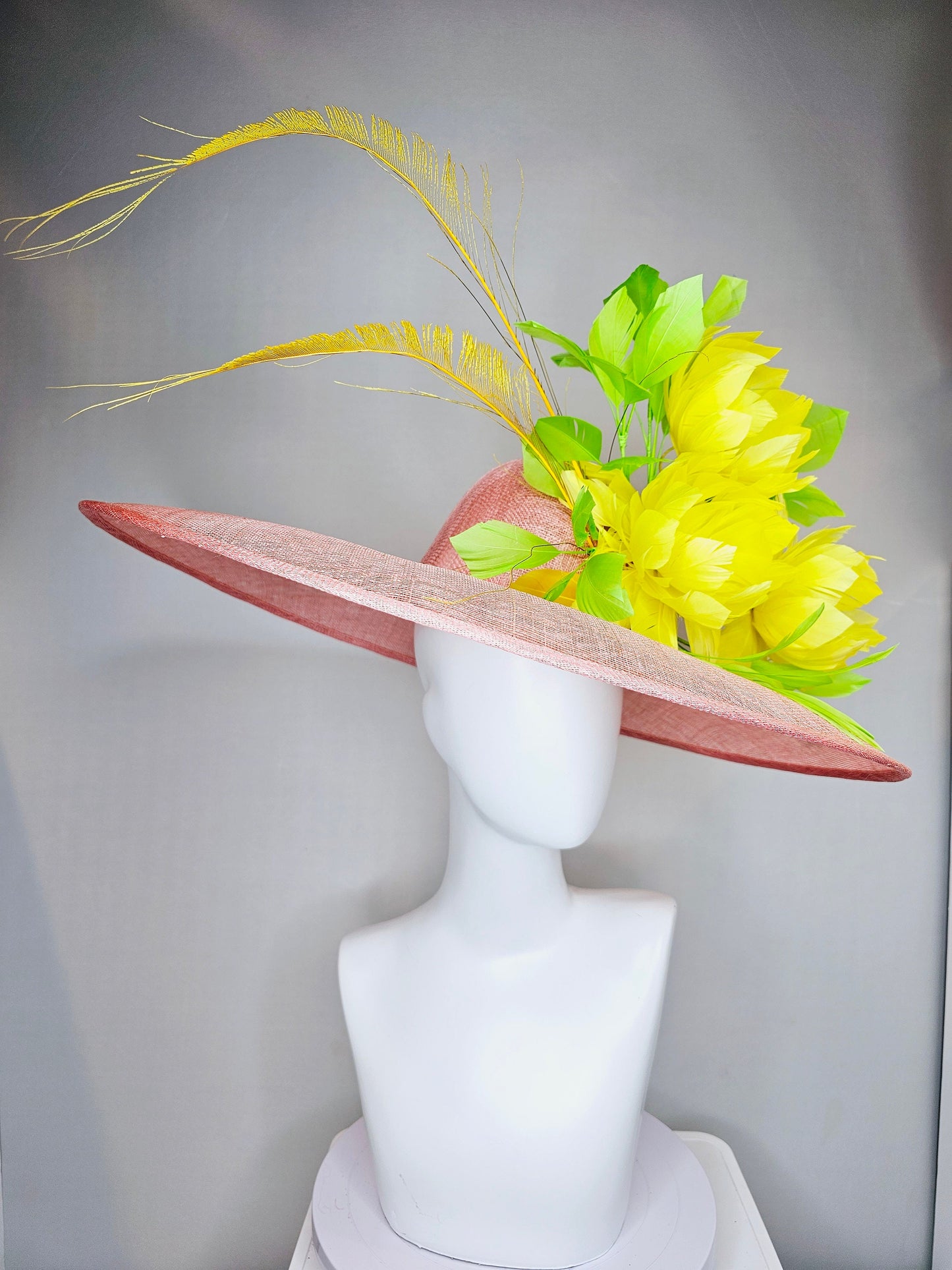 kentucky derby hat large wide brim sinamay blush pink hat w large green feathers bright yellow feather flowers w long tall yellow feathers