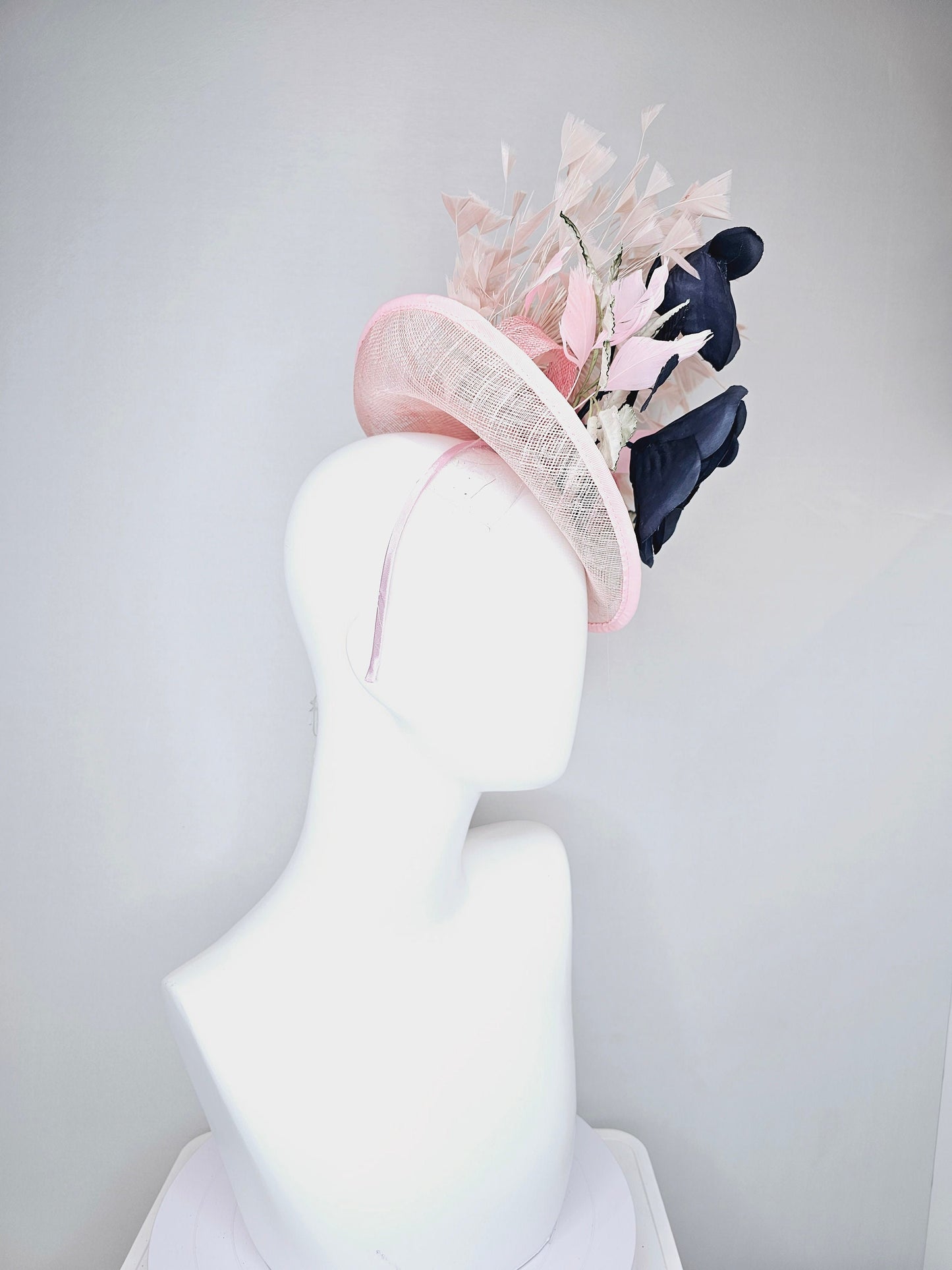 kentucky derby hat fascinator light pink sinamay saucer with black silk flowers silver green ivory leaves and pink feathers