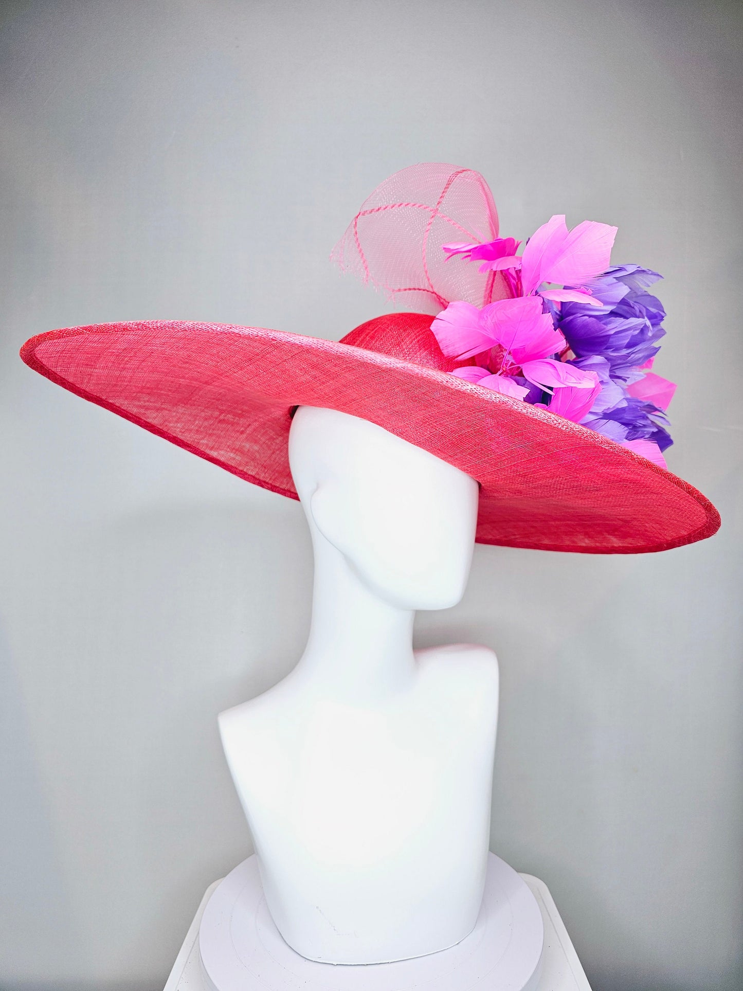 kentucky derby hat large wide brim sinamay coral pink hat with pink feathers and purple fluffy feather flowers w pink crinoline