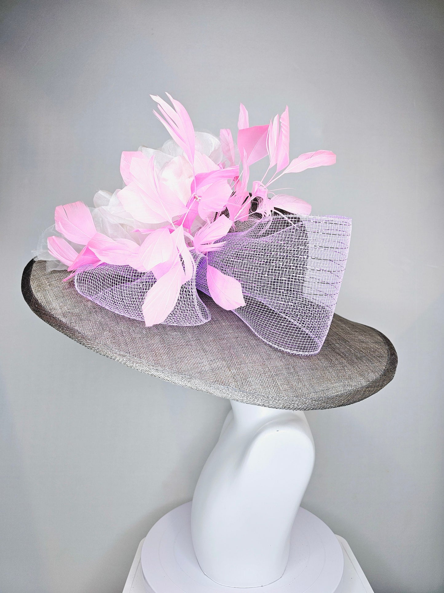 kentucky derby hat large wide brim sinamay gray hat with large white ivory organza flower and baby pink feathers with lavender crinoline