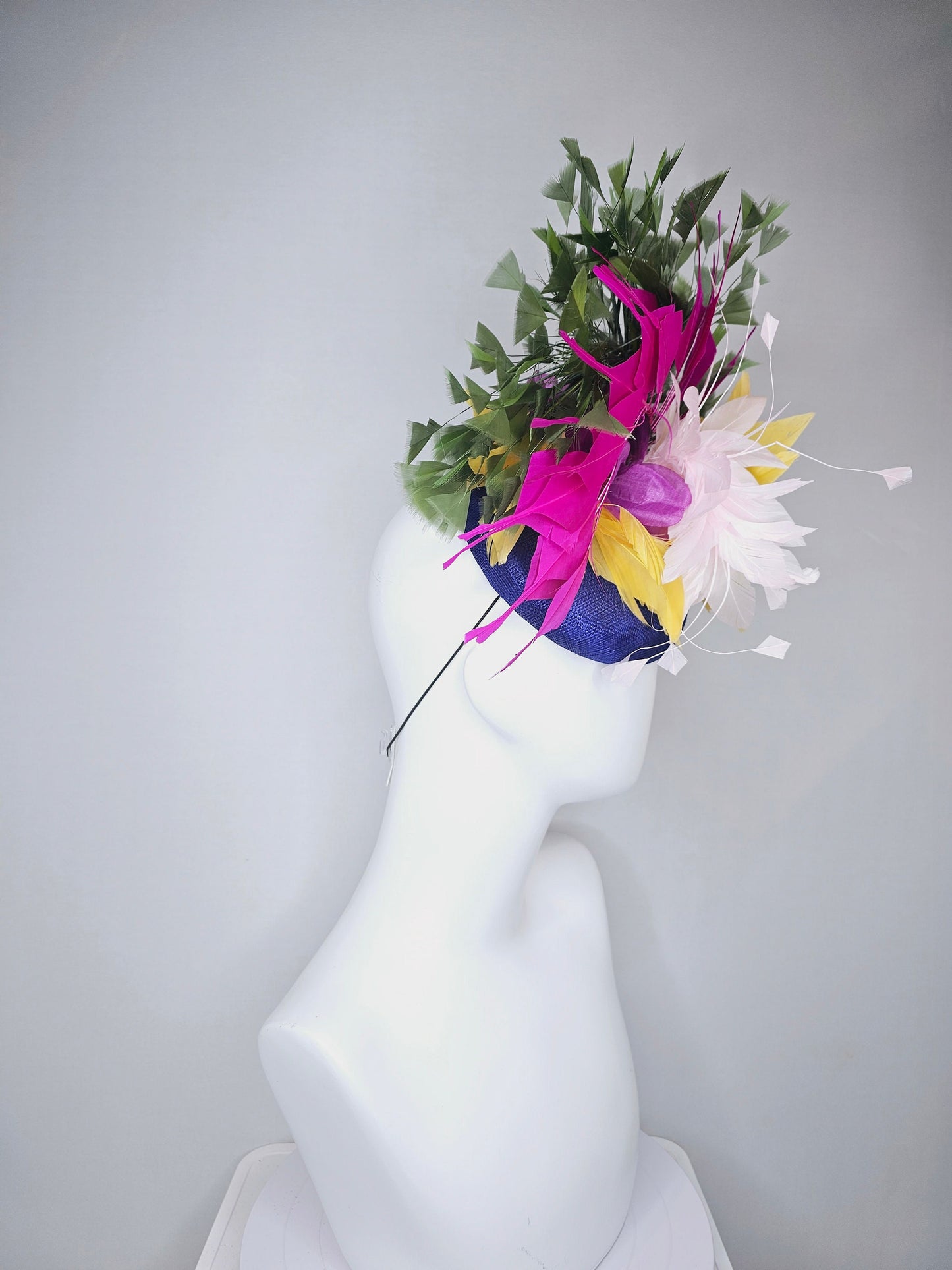 kentucky derby hat fascinator royal blue sinamay with bright yellow, ivory white,fuchsia pink, and hunter green branching feathers