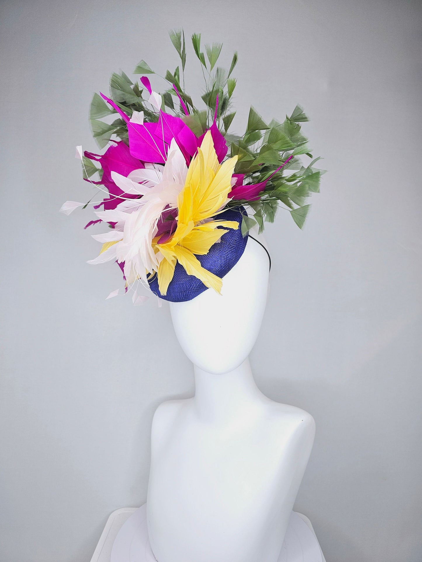 kentucky derby hat fascinator royal blue sinamay with bright yellow, ivory white,fuchsia pink, and hunter green branching feathers