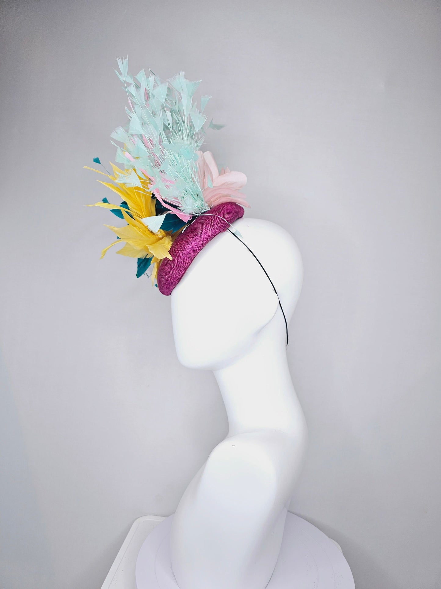 kentucky derby hat fascinator purple violet sinamay with colorful bright yellow, teal blue, baby pink, and baby blue branching feathers