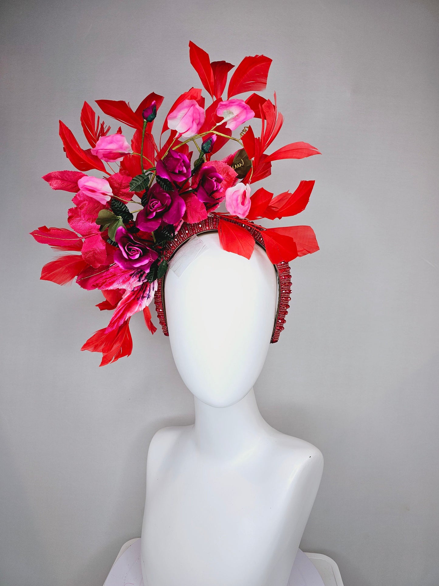 kentucky derby hat fascinator red wine roses with pink white ombre flowers and large red feathers on red beaded crystal headband