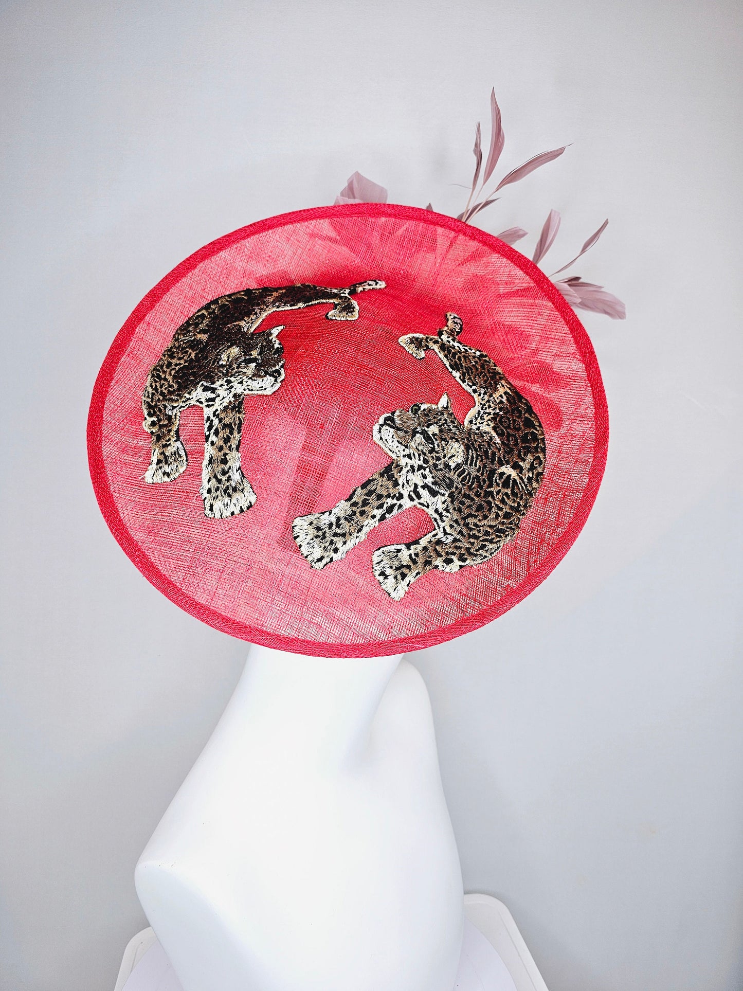 kentucky derby hat scarlet red sinamay saucer with black ivory gold leopard embroidered with blush pink feathers