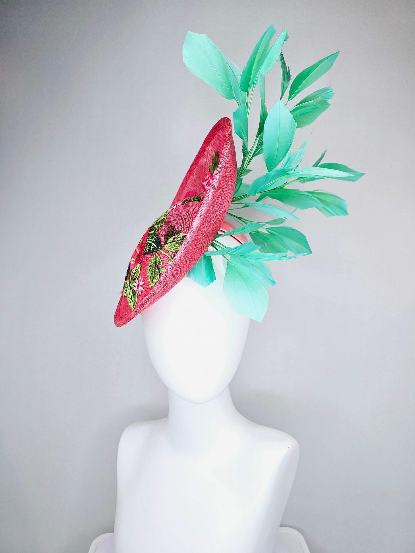 kentucky derby hat peach pink sinamay saucer with peach green gold pink embroidered flowers with green feathers