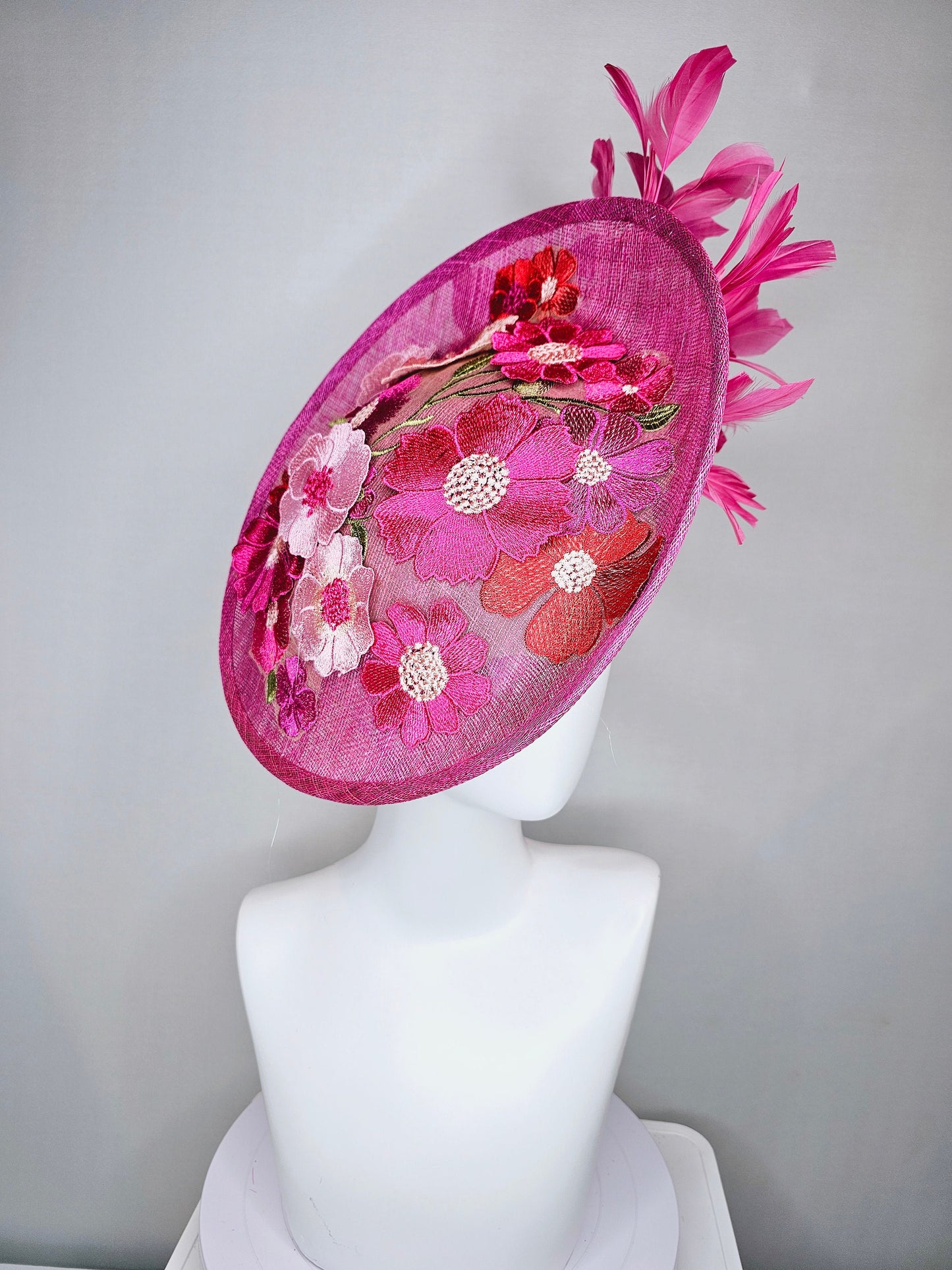 kentucky derby hat fascinator pink sinamay saucer with red pink green ivory floral embroidered, and pink feathers