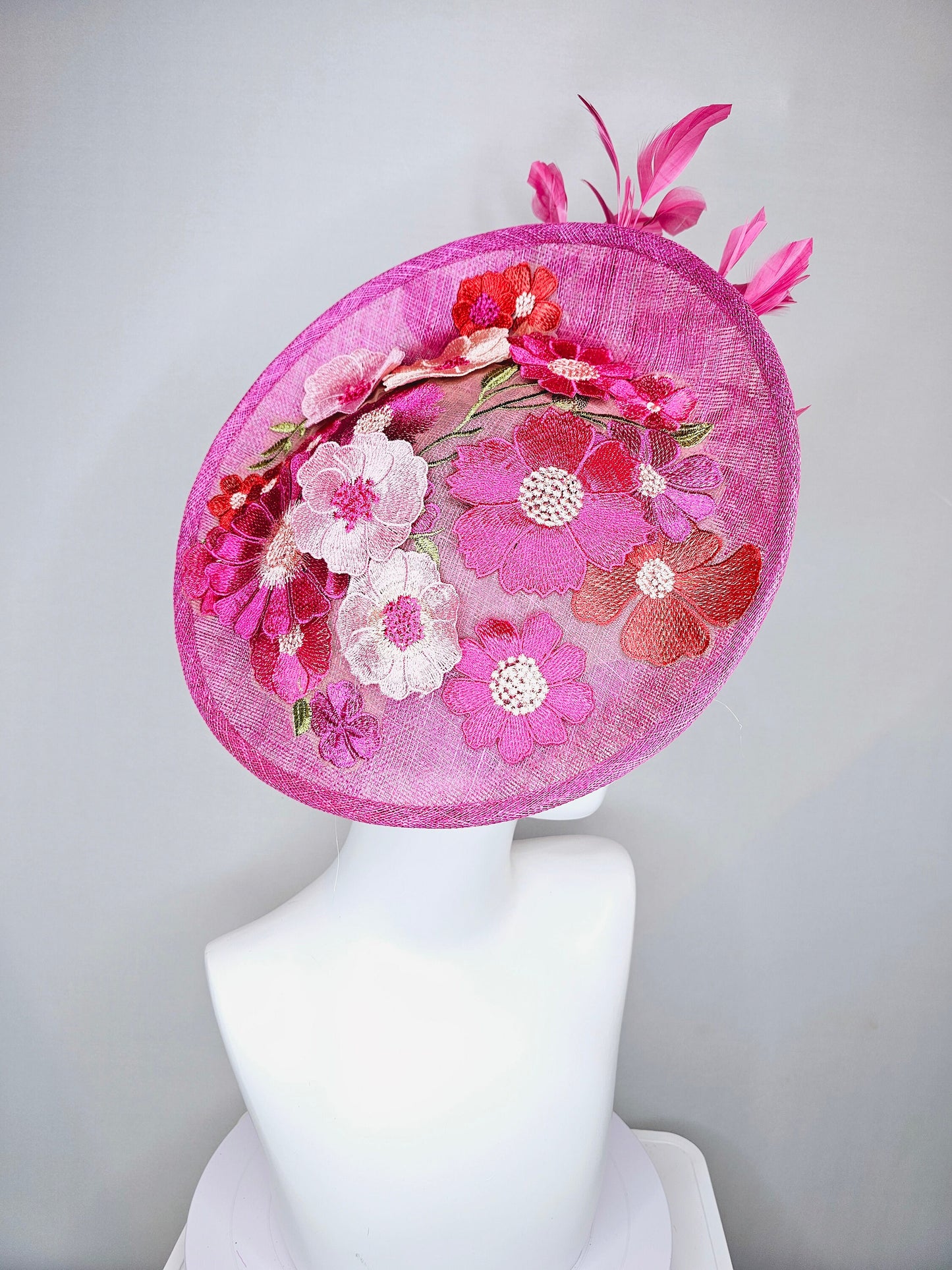 kentucky derby hat fascinator pink sinamay saucer with red pink green ivory floral embroidered, and pink feathers