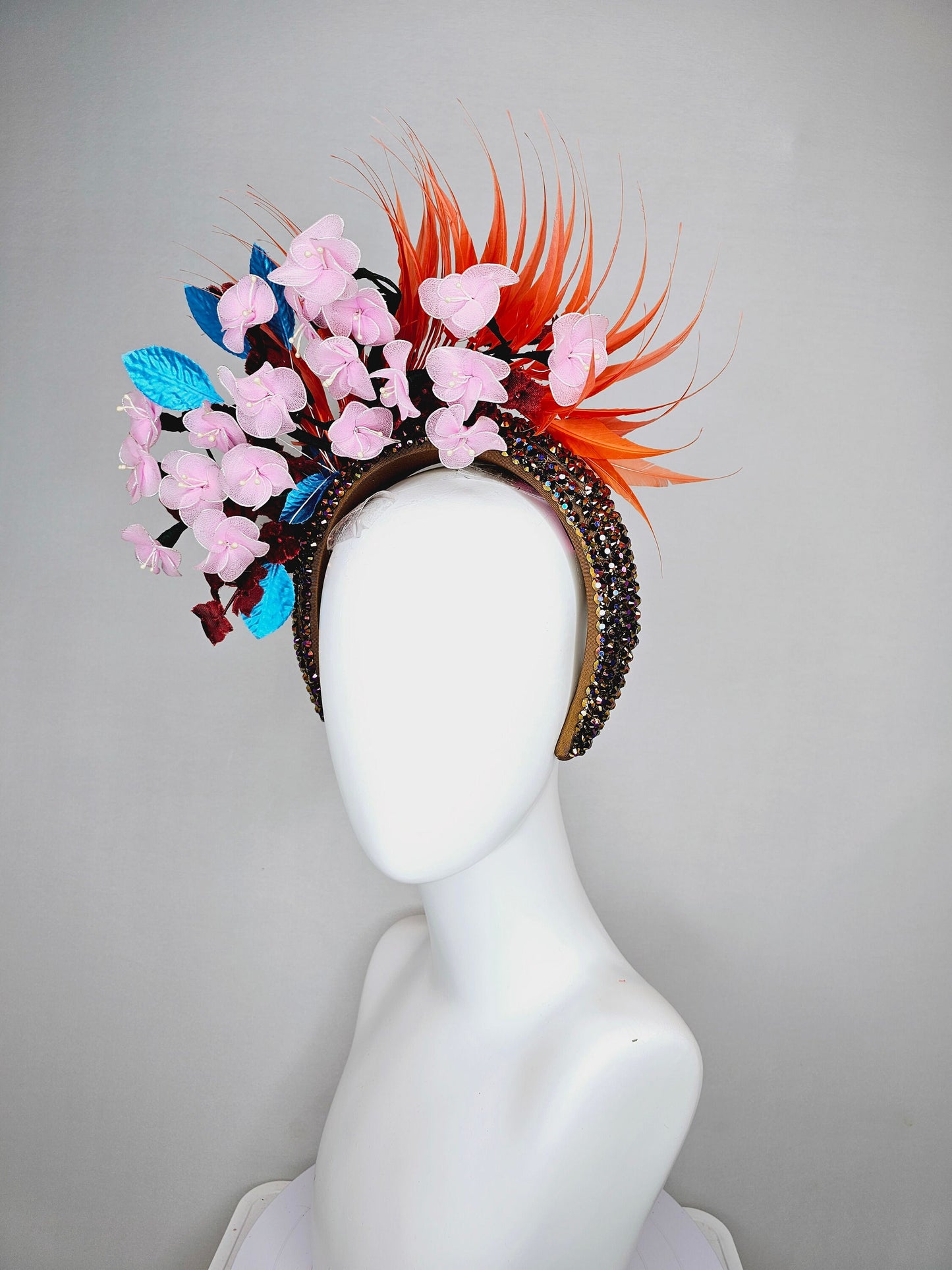 kentucky derby hat fascinator swarovski crystal rhinestone headband in brown iridescent brunette with light pink flowers,and orange feathers