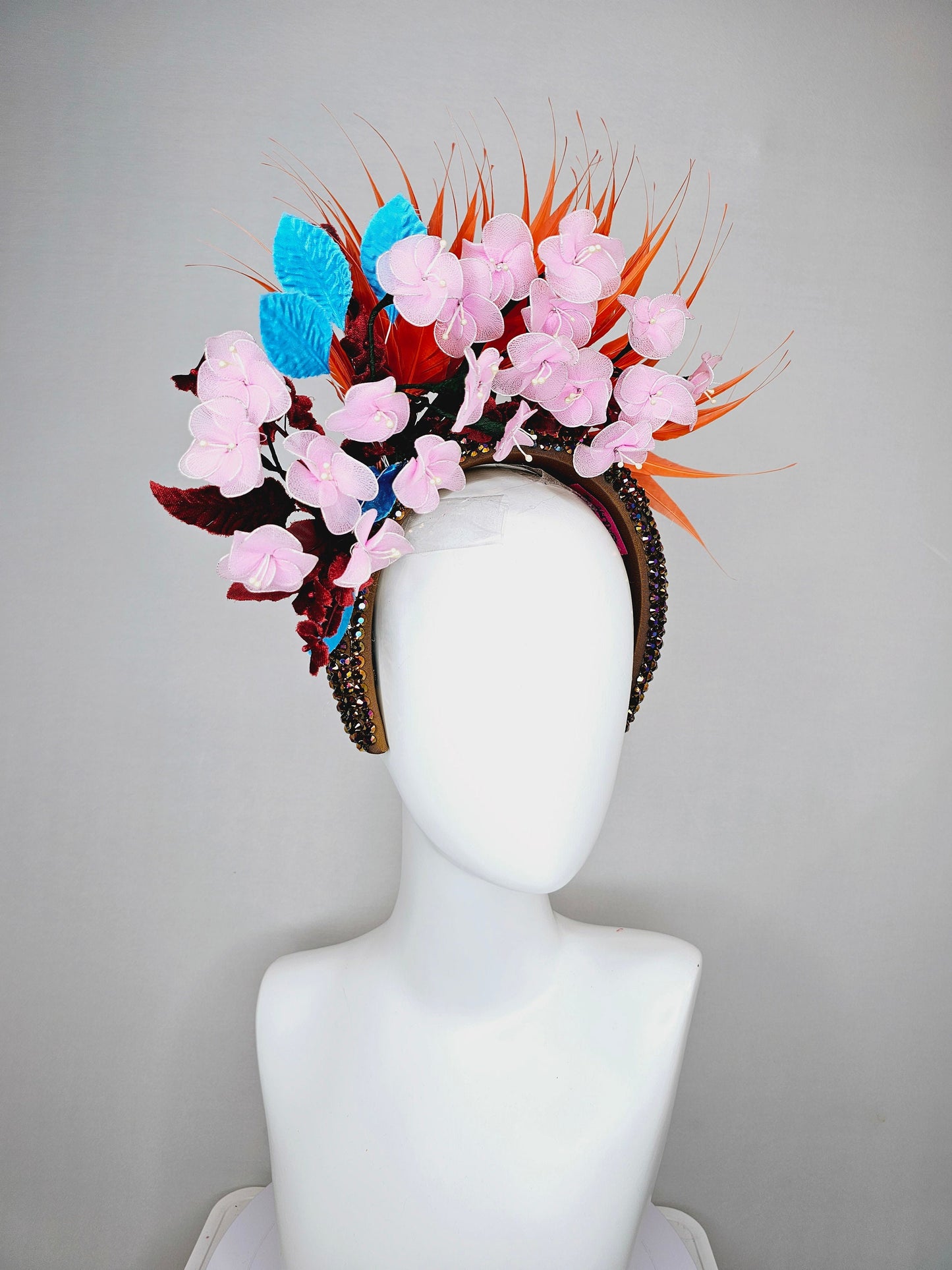 kentucky derby hat fascinator swarovski crystal rhinestone headband in brown iridescent brunette with light pink flowers,and orange feathers