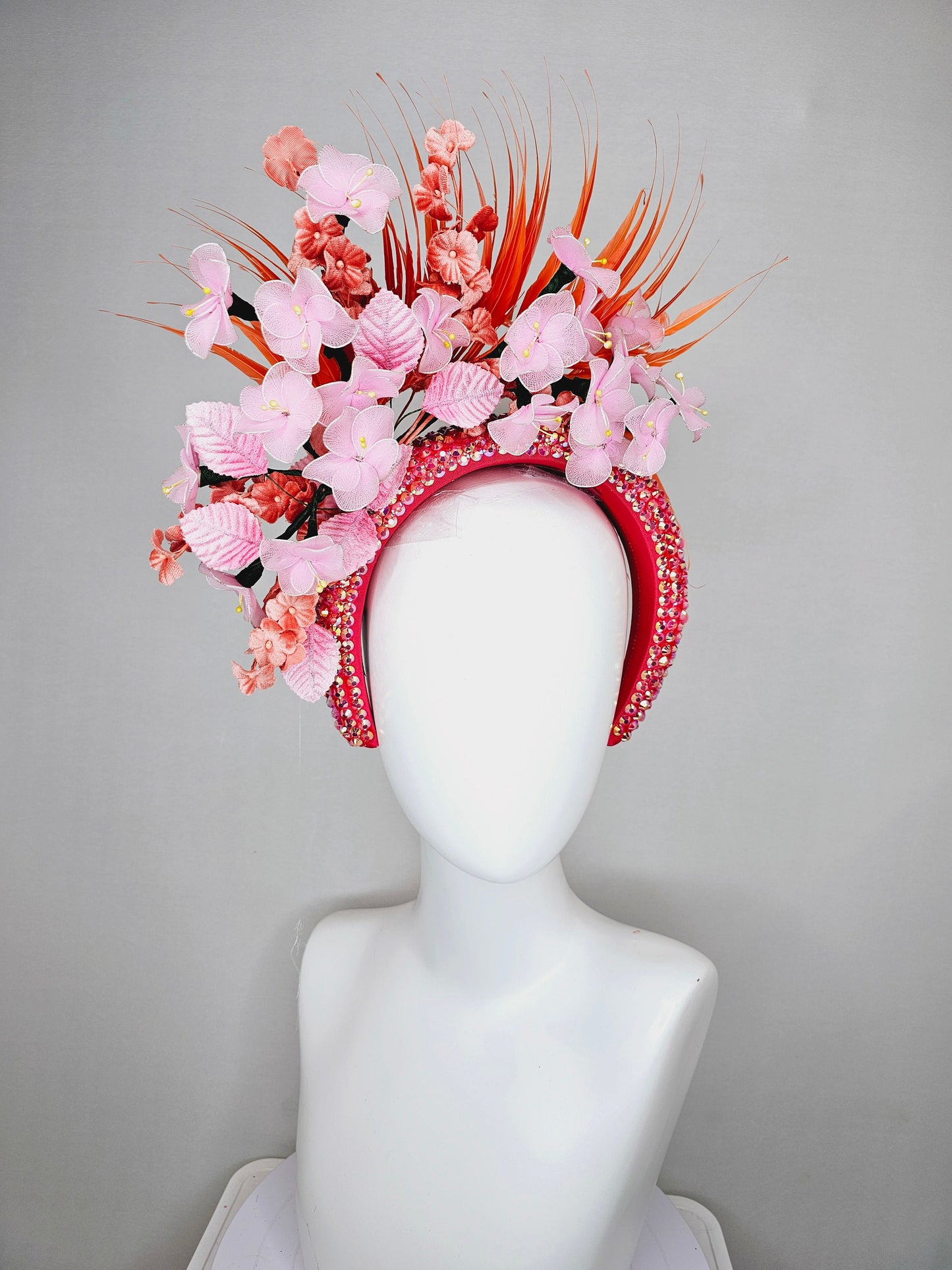 kentucky derby hat fascinator orange feathers on iridescent crystal coral headband with light pink wire mesh flowers,baby pink leaves