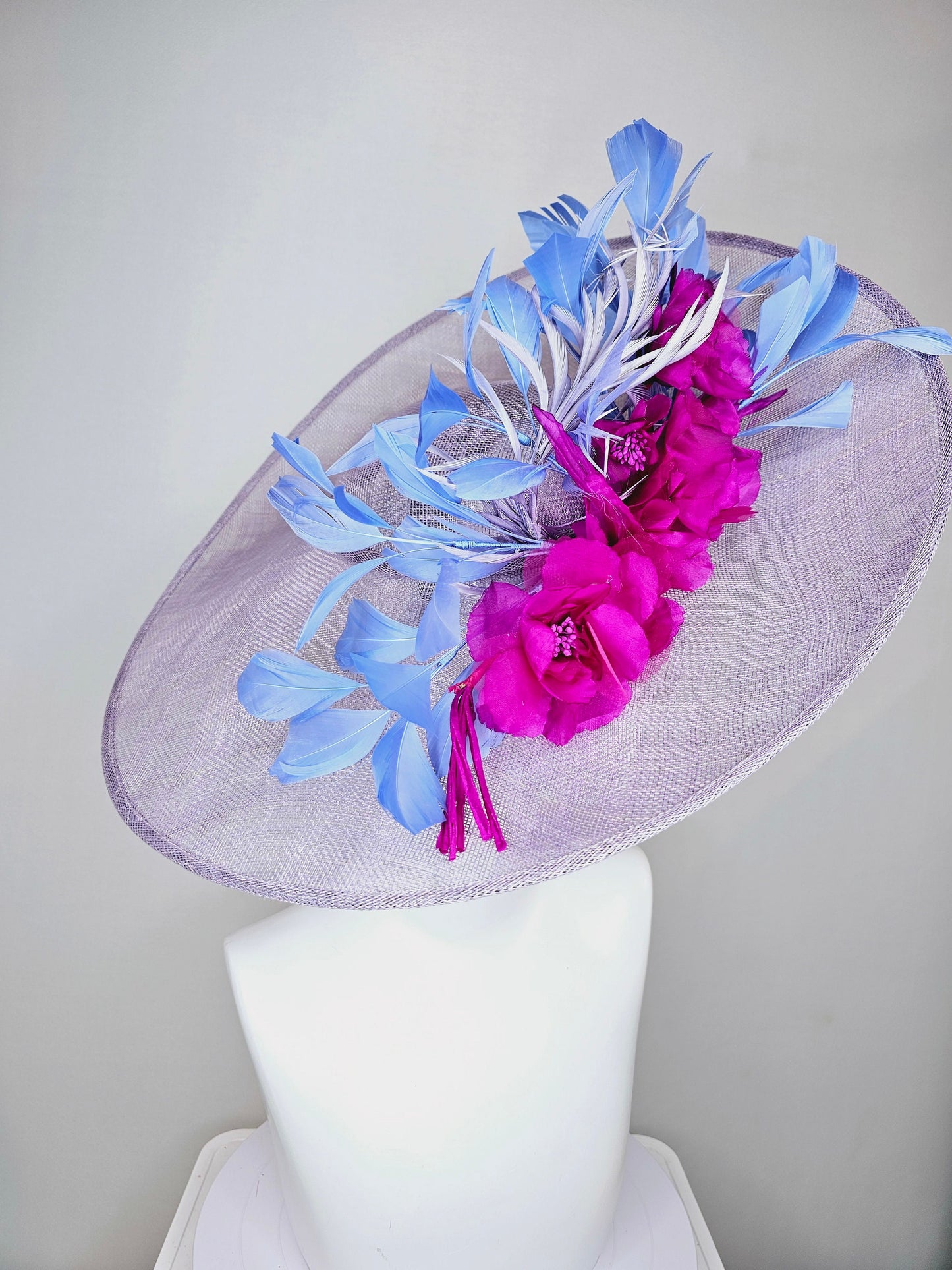 kentucky derby hat large wide brim sinamay lavender purple hat with fuchsia pink organza satin flowers and cornflower blue feathers