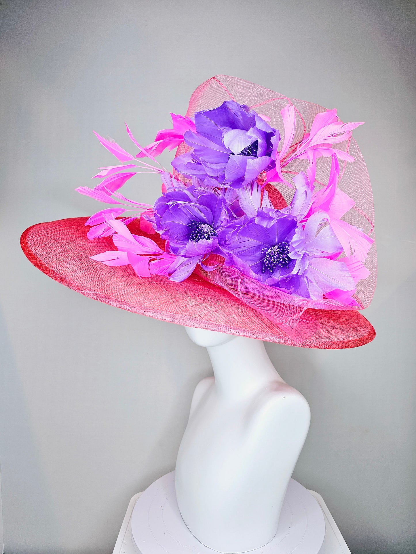 kentucky derby hat large wide brim sinamay coral pink hat with pink feathers and purple fluffy feather flowers w pink crinoline