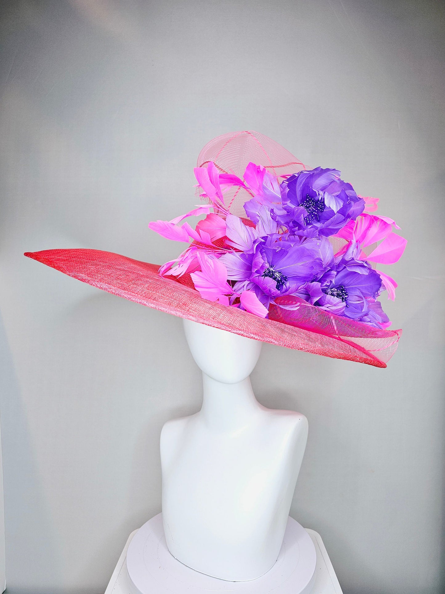 kentucky derby hat large wide brim sinamay coral pink hat with pink feathers and purple fluffy feather flowers w pink crinoline