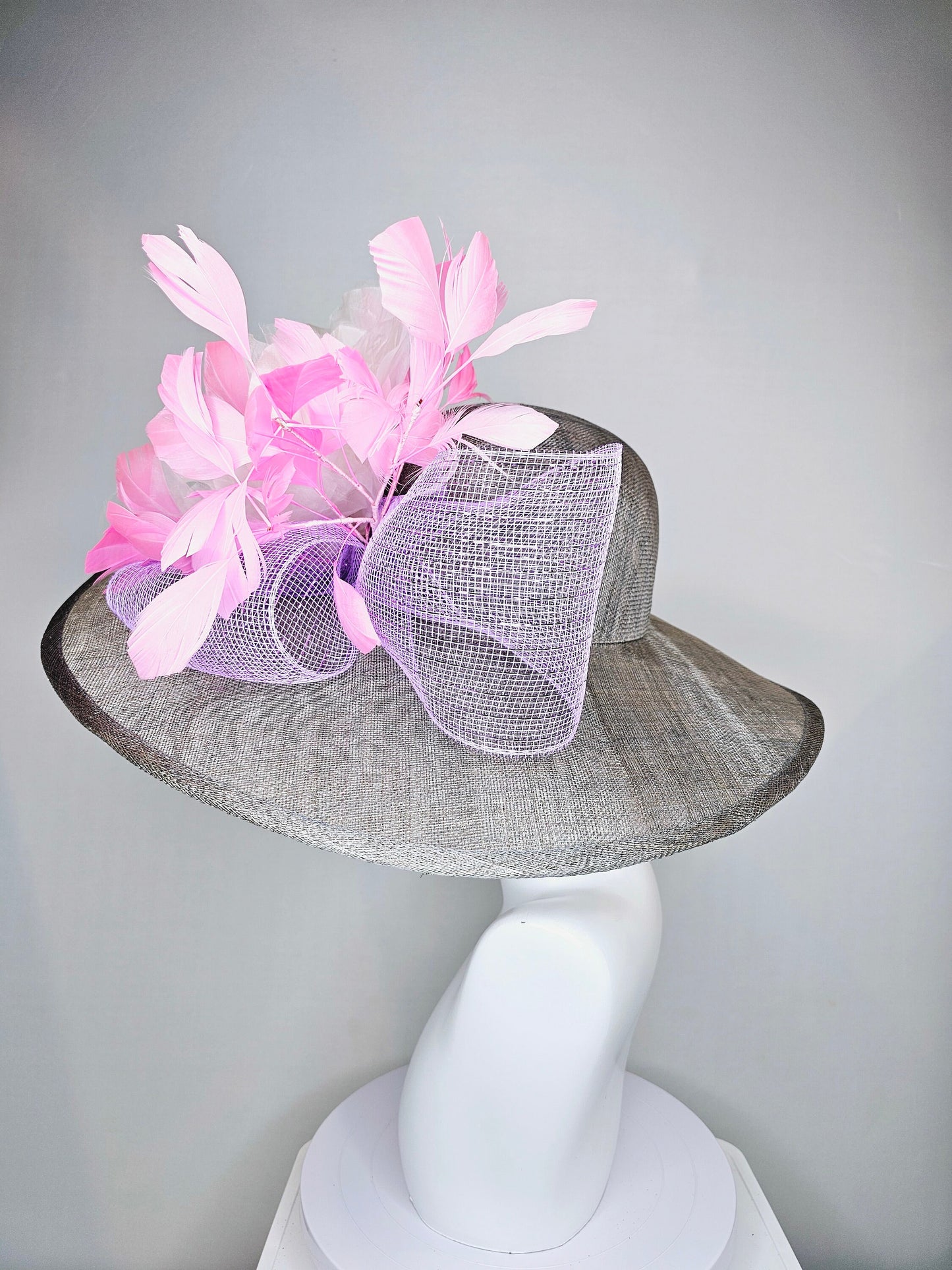 kentucky derby hat large wide brim sinamay gray hat with large white ivory organza flower and baby pink feathers with lavender crinoline