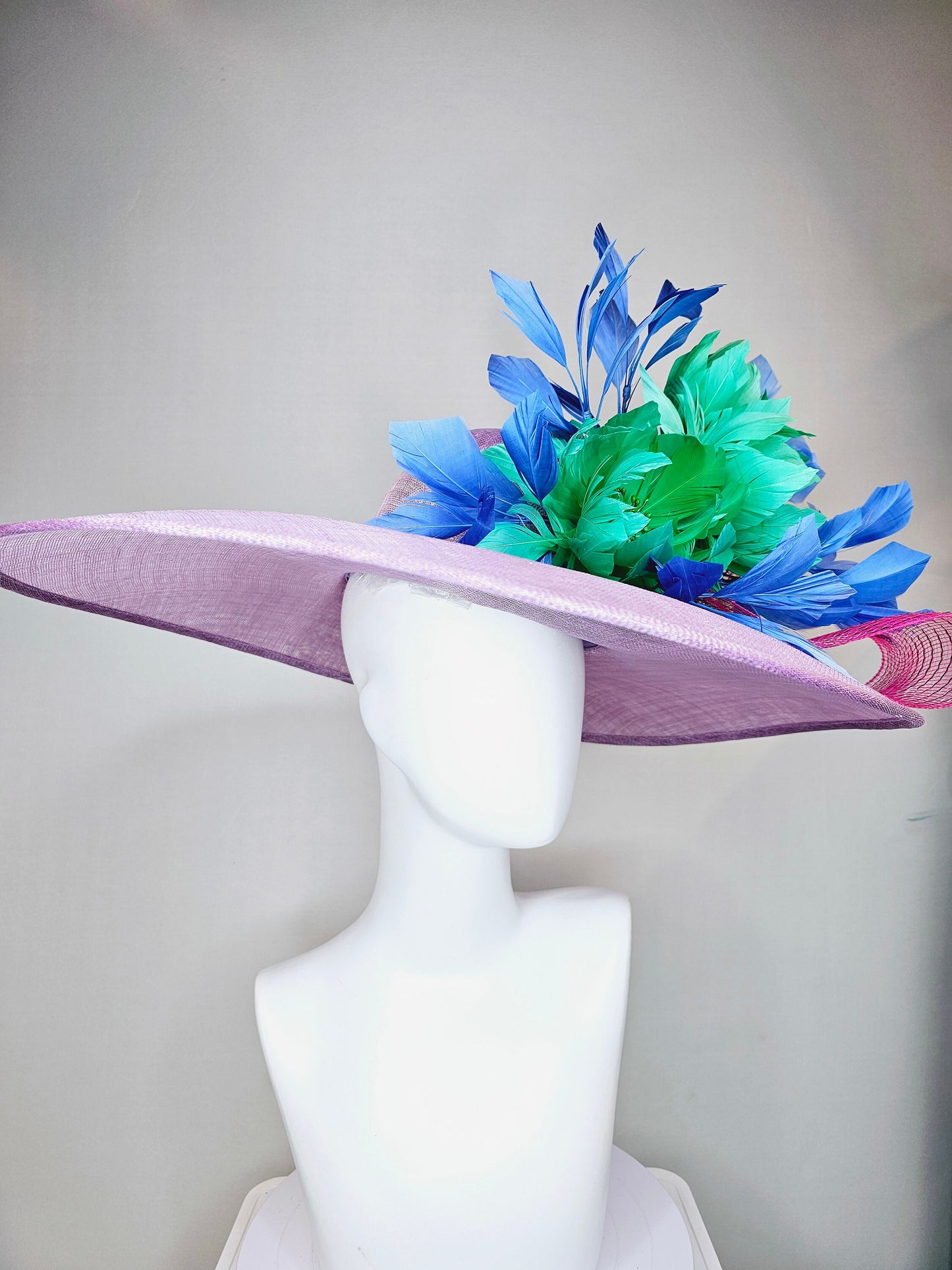 kentucky derby hat large wide brim sinamay purple lavender hat w emerald green feather flowers, blue feathers and bright pink crinoline