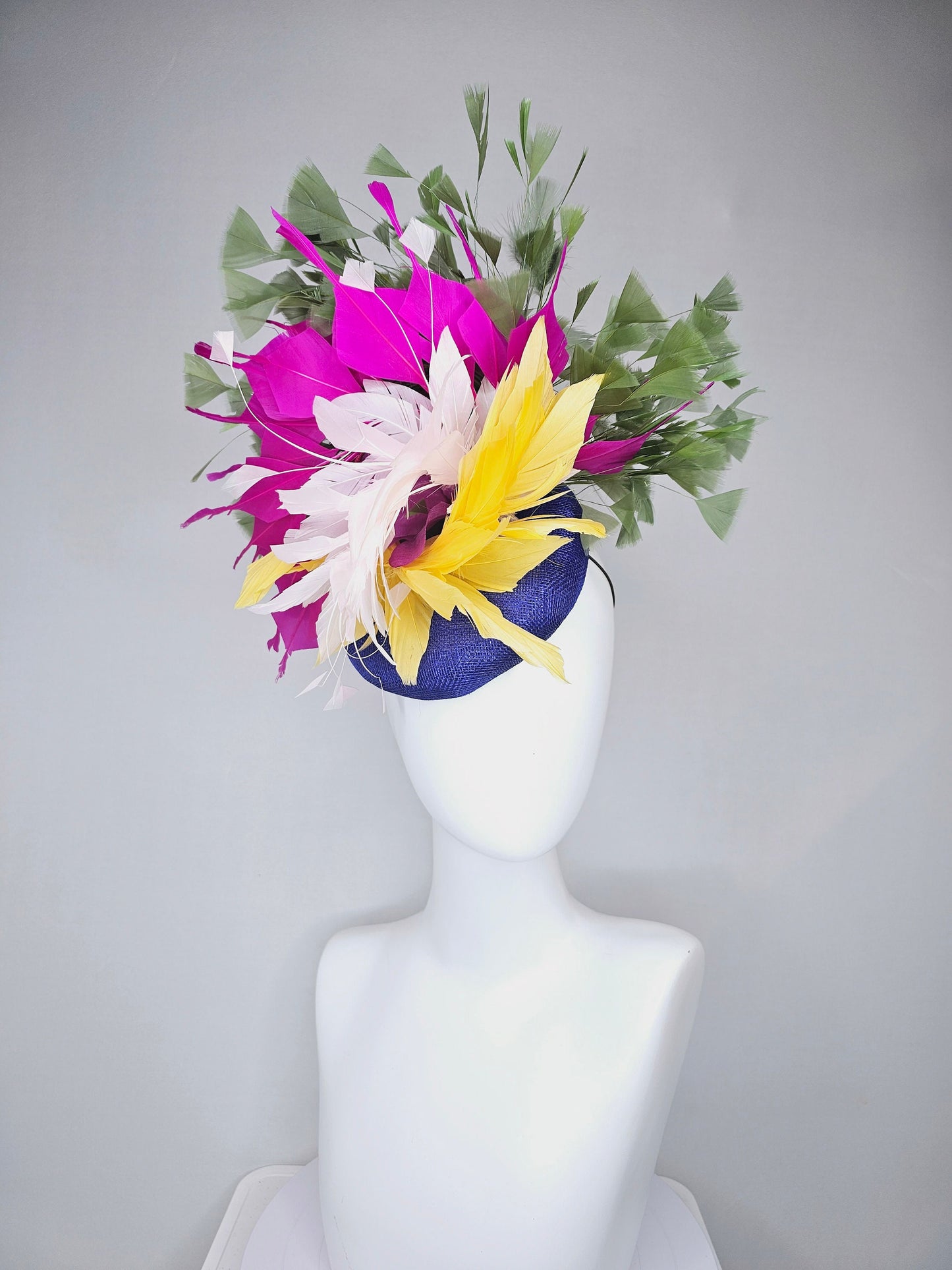 kentucky derby hat fascinator royal blue sinamay with bright yellow, ivory white,fuchsia pink, and hunter green branching feathers
