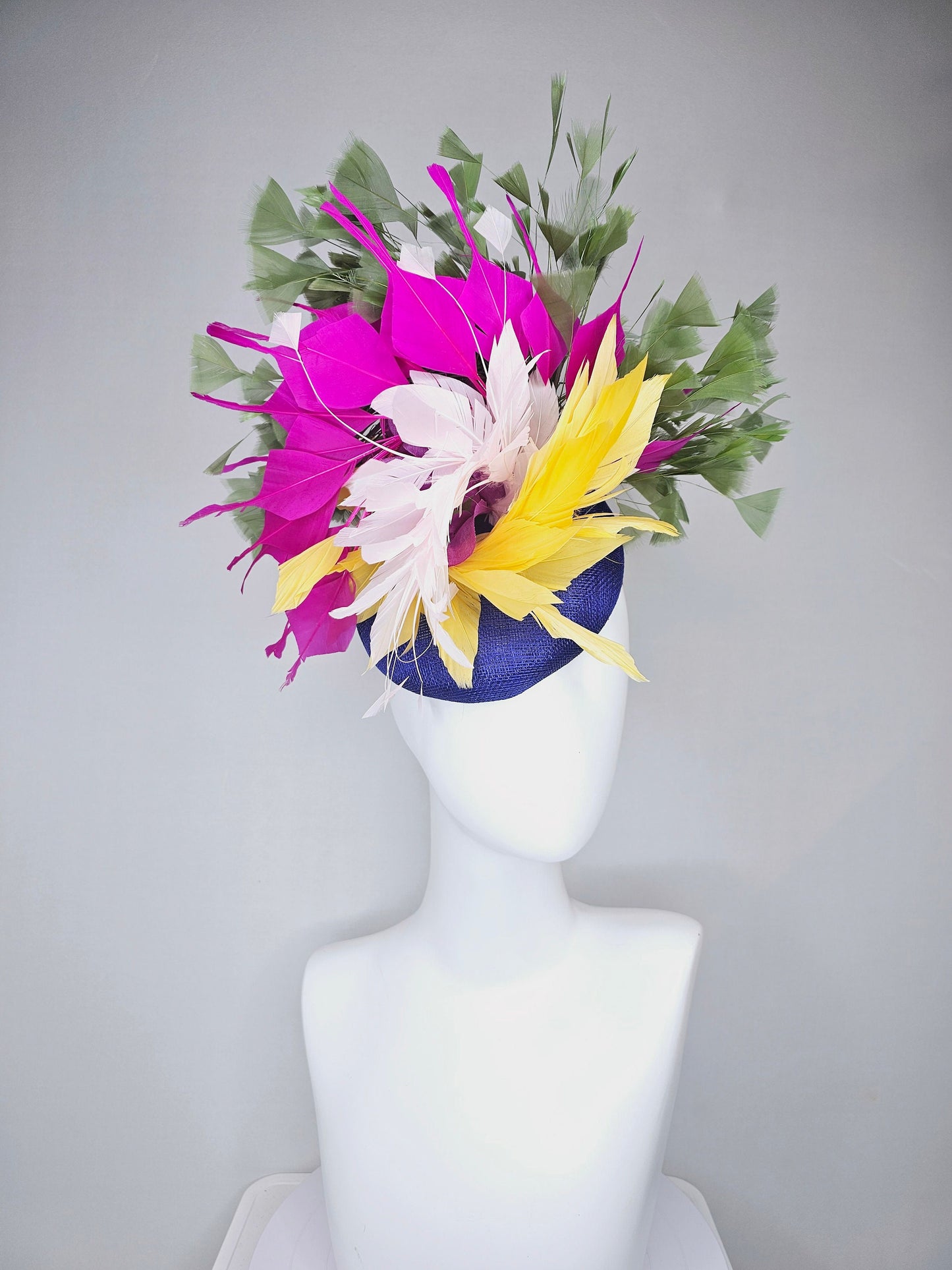kentucky derby hat fascinator royal blue sinamay with bright yellow, ivory white,fuchsia pink, and hunter green branching feathers
