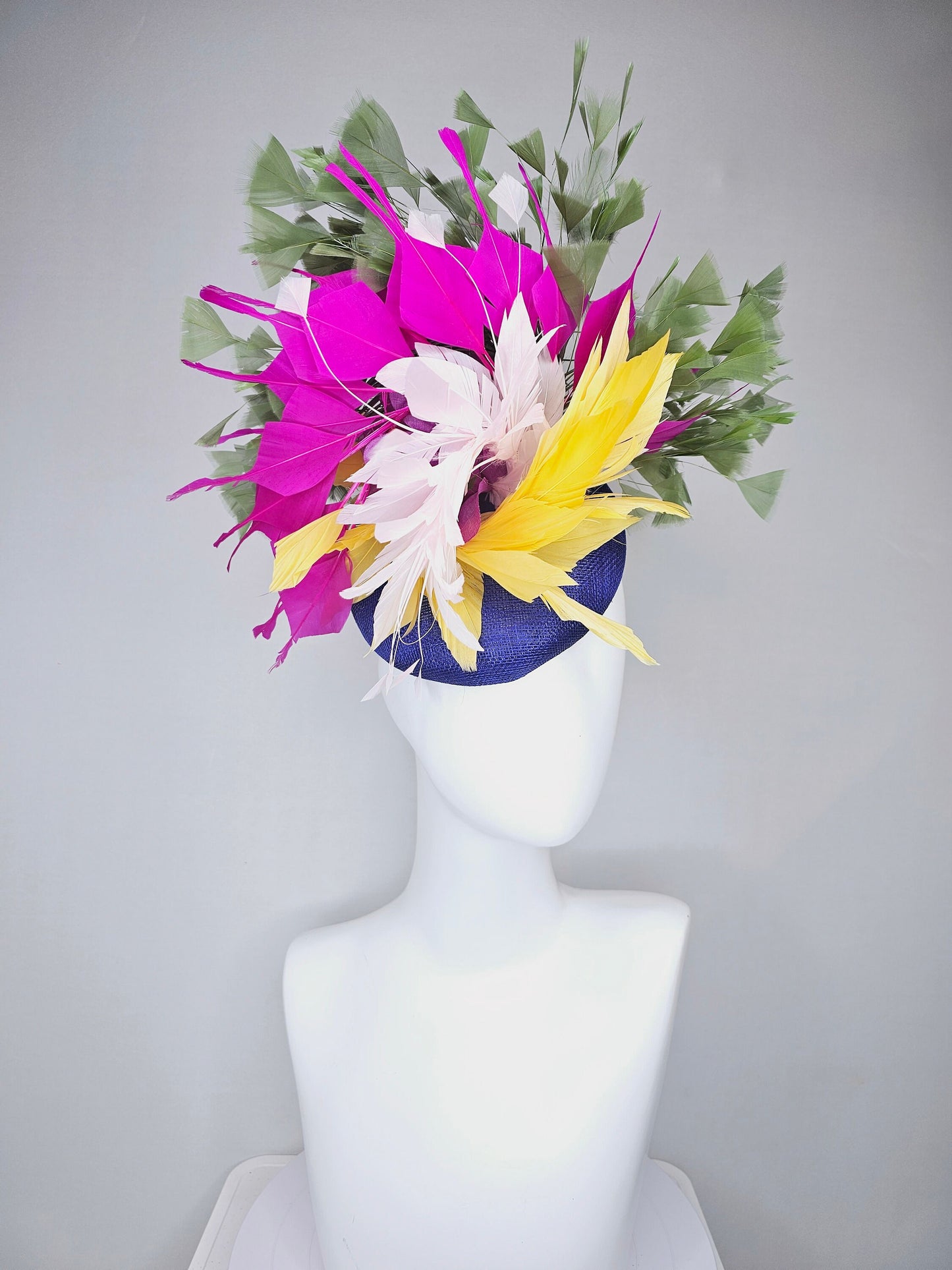 kentucky derby hat fascinator royal blue sinamay with bright yellow, ivory white,fuchsia pink, and hunter green branching feathers
